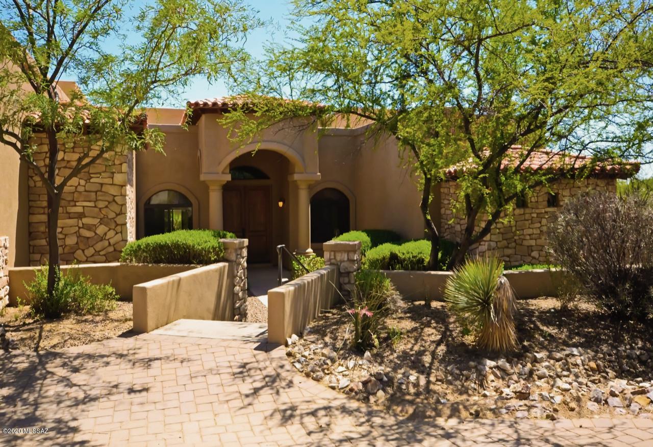 Tuscany In Tucson! This Gorgeous Mediterranean-Style House Brings Italy To The Southwest, And Makes You Feel Like You're Living In A Villa. Natural Sunlight Permeates Through The Open Layout, And Lights A Giant Communal Area In The Center Of The Home. Enjoy Private Views & The Sounds Of Nature, While You're Tucked Away & Distanced From Neighbors. Professionally Cleaned & Landscaped, To Be Move-In Ready. This Custom-Built Home Is 1-Of-A-Kind!