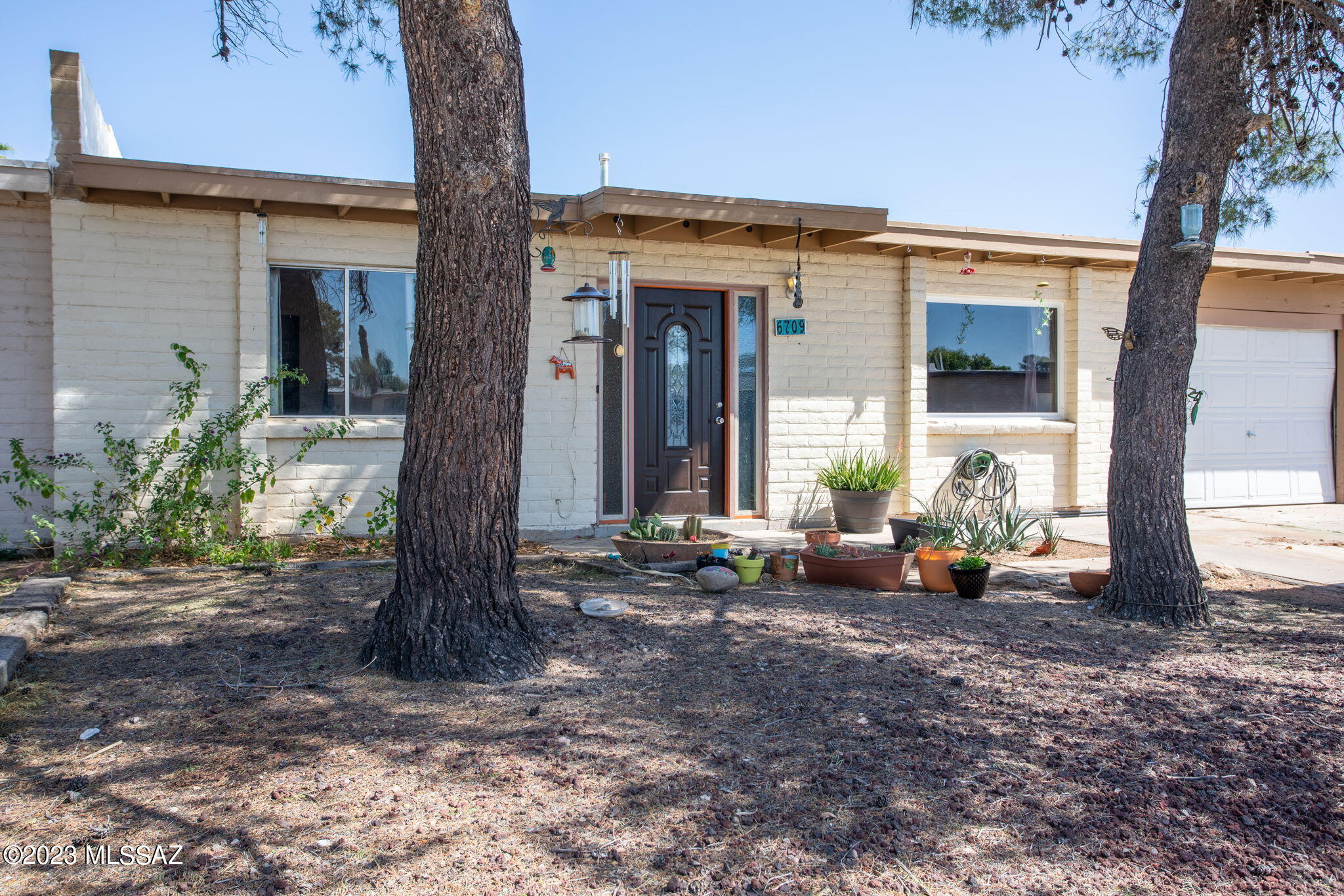 An amazing opportunity to become a homeowner is being presented to you! This adorable townhouse is situated in a pleasant community with two neighborhood parks nearby - perfect for weekend picnics or relaxing strolls. This home enjoys convenient access to Kolb and Golf Links, which means shopping and restaurants are just minutes away! The house's proximity to Davis Monthan, PCC East, and many office parks will make your commute a breeze. Inside, you'll find lots of natural light throughout. Relax in your spacious yet cozy living room, enjoy delicious meals in your large dine-in kitchen, and enjoy the mornings in your bright Arizona room. And summers won't be a problem, with the gorgeous pines casting shade in front, and the HVAC system installed in 2020! Make plans to see this one today!