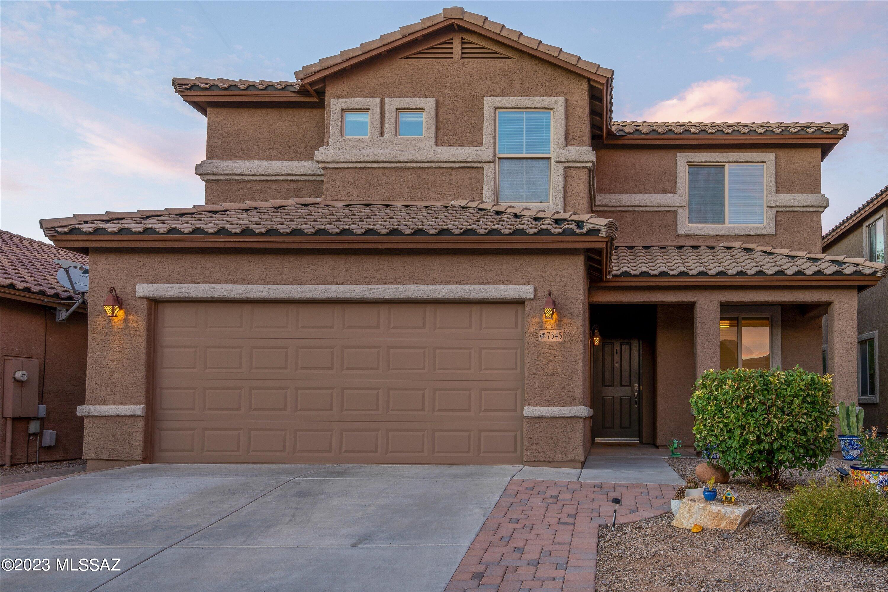 Welcome to this must see 4 bedroom, 2.5 bathroom, and 2500 sq feet of living space, located in the southeast part of town in the Vail School District. Beautiful ceramic tile, granite countertops in kitchen and bathrooms, stainless steel appliances with double oven, and 42 inch cabinets in kitchen. Enjoy your parties with a fully landscaped back yard that includes pavers and gravel with a built-in-grill, path lights with timers, bench seats, and an extended patio. 

Other features include a water softener, an osmosis water system, surround sound in family room, and an extended garage. Exterior and garage have been recently painted. This house has tons of upgrades. This is your chance of owning this beauty.