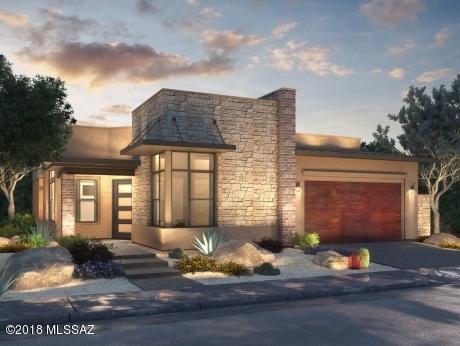 Brand NEW Energy efficient home ready NOW! Unobstructed views of rolling boulders and desert landscape in this secluded Nicklaus home, built-in fire pit, outdoor kitchen, gourmet kitchen with floor to ceiling windows, large island looks to great room, dining area, wet bar, KitchenAid apls. Boulder Vista at Stone Canyon is luxury living nestled within rock outcroppings and vistas of the Catalina and Tortolita Mountains. Enjoy peaceful solitude amongst the lush natural Sonoran desert located within prestigious Stone Canyon in Oro Valley. Amenities include Phil Mickelson's Stone Canyon golf course and fitness center. Known for their energy-efficient features, our homes help you live a healthier and quieter lifestyle while saving you thousands on your utility bills.