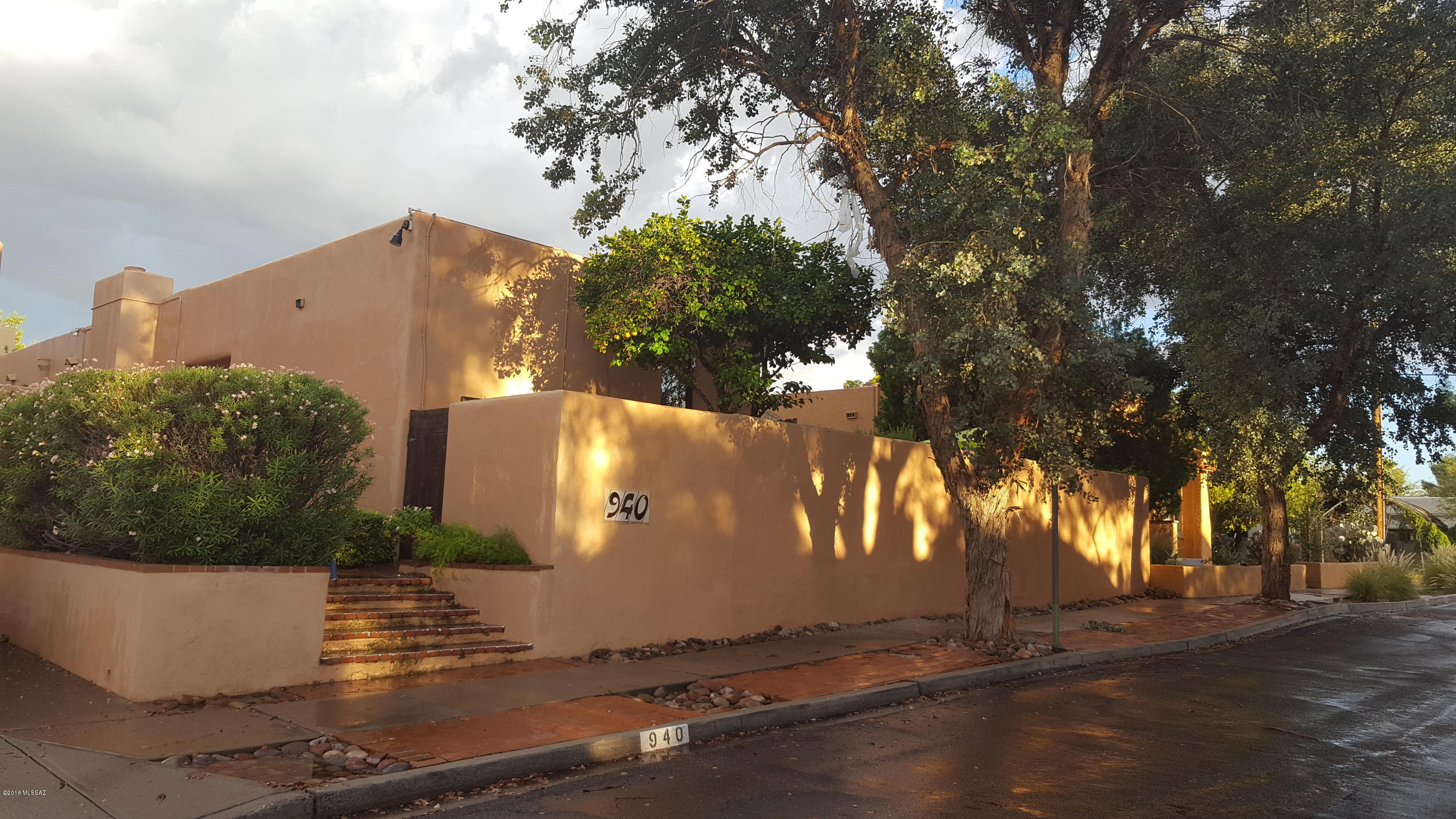 Enjoy the beautifully landscaped patios or the inviting pool as both spaces give opportunity to reflect on the beauty of desert living. Located in historical Sam Hughes a 4 min walk to UofA the main house comes complete with 3 bedrooms & 3 baths, with artistic elements such as stained glass windows & mosaic tile touches. A welcoming kitchen and dining area remains the hub of this busy Inn. Guests enjoy peaceful living while being conveniently close to the University, award winning schools, shops, restaurants, transportation, Museums and Parks. In 1983 the owner at the time added a 2 story residence in perfect harmony with the 1938 classic Sante Fe main house. Many modern conveniences have been added to enhance the property for today's discerning Buyer. The income produced is a bonus!
