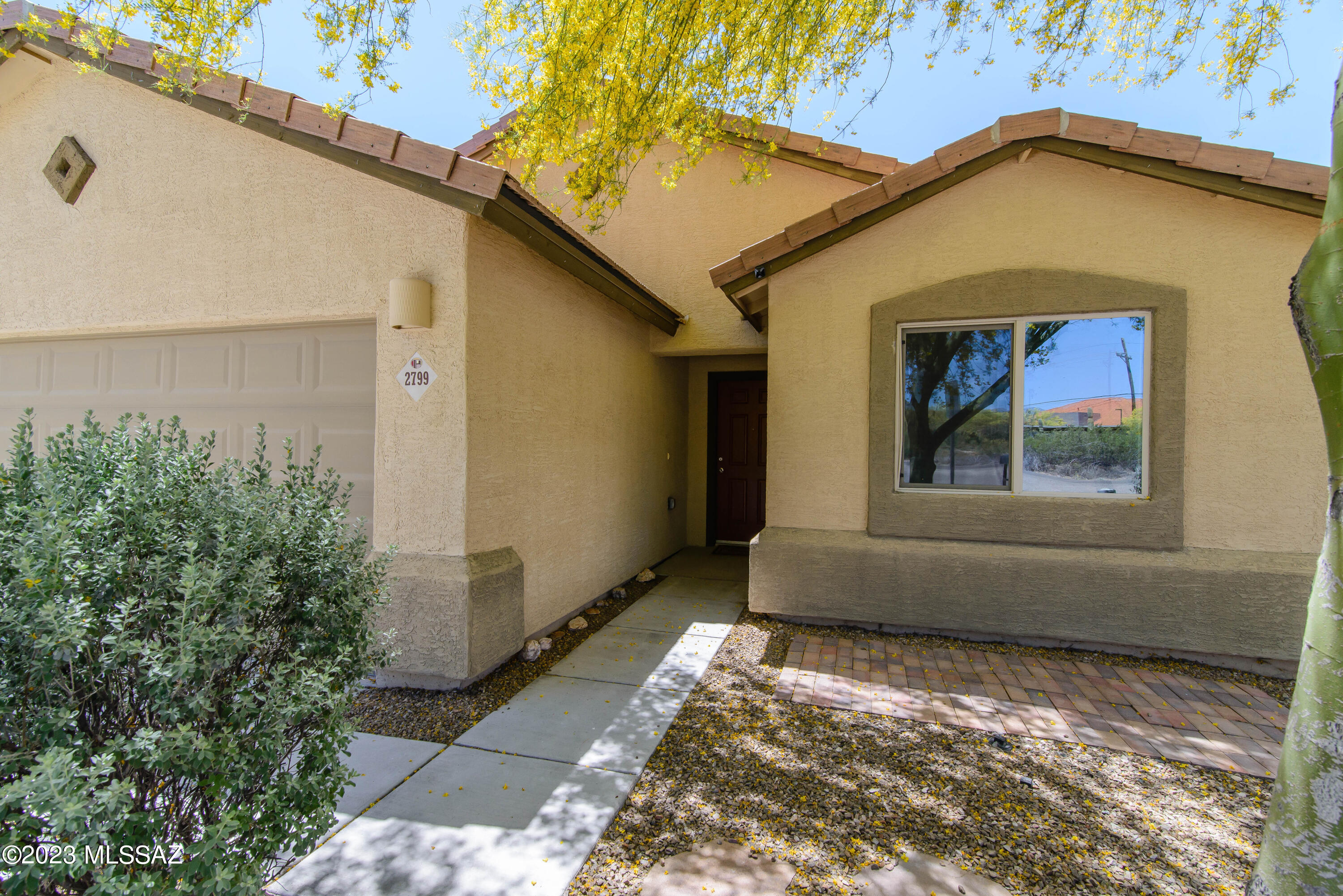 Range Pricing- Seller will accept and/or counter offers between $369,900 - $379,900. Welcome to this unique Boutique Community of 10 homes. Enjoy 1,715 square feet. Great Room Concept, 4 Bedrooms, w/ a split floor plan, 2 Bathrooms. Large laundry room with extra shelving. Kitchen boasts Granite Counter tops, Gas Range, Stainless steel finish on the appliances , the Refrigerator conveys. Oversized Kitchen Island with room for bar stools. Dining Area with natural light. Primary Bedroom on one side of the home boasts a large walk in closet. Primary bathroom has executive height vanities, Shower & a bonus storage area for towels & linens. Low maintenance front & rear yards. Back yard borders the wash with mature vegetation. Well maintained home- Termite Warranty until 3/27/2025. Move In Ready!