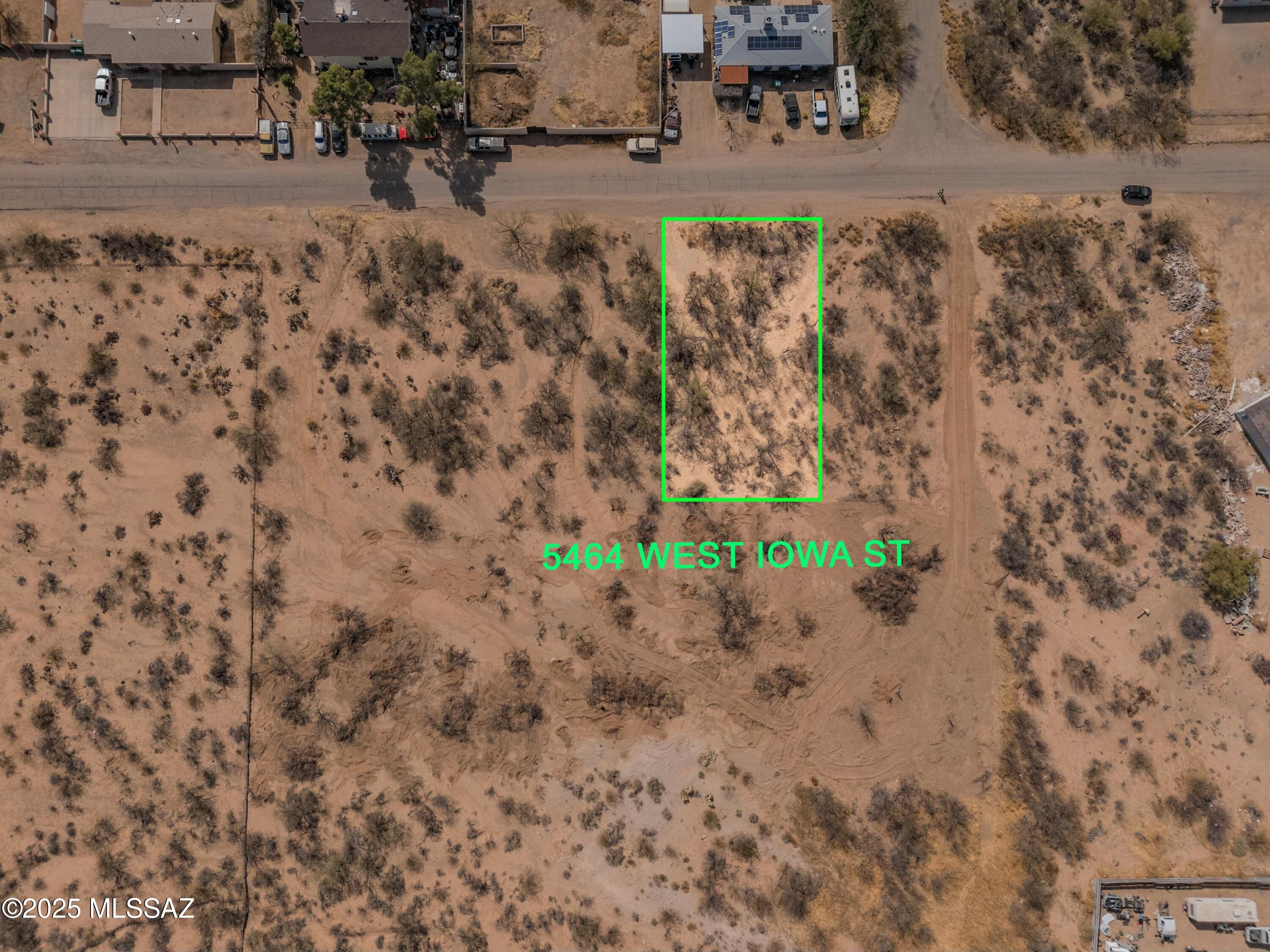 This property consists of five separate parcels which can be sold individually or as a package. The land is perfect for creating a residential community. Zoned CR3 (small site-built homes) and CB2, each lot ranges from 7,300 to 7,550 square feet. Water service is available, though it runs along Sheridan and Sunset. Developers will need to cover the cost of extending water pipes from Iowa and installing meters. Excellent development opportunity! Additional parcels are listed under these MLS numbers: 22506081, 22506078,  22506082, 22506079,  22506080. If purchased individually, a single family residence with guest house is allowed.