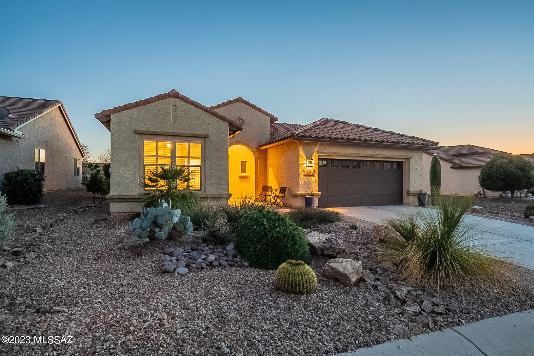 MOUNTAIN VIEWS, PRIVACY, PAID SOLAR and so much more! The main attraction, though, is the South-facing backyard with views of the Santa Rita's. Fountain attracts cardinals, finches, quail, all sorts of our AZ birds. Enjoy the gas FP as you watch the sun set. Privacy ensured with the arroyo behind and culvert on the side.  New roof 2021, PVC irrigation 2021, water heater 2019,  softener 2021. Four-foot extended garage w/util sink, central vac. Plantation shutters, 2x6 construction, low-E vinyl windows. Granite counters, pull-outs, under cabinet lighting, lighted walk-in pantry. Bay windows in dining and primary bedroom.  Spacious primary shower w/seat, grab bars, walk-in closet & linen closet. Guest bedroom has Murphy Bed w/desk extension. Quiet neighbood.  You'll love this house!