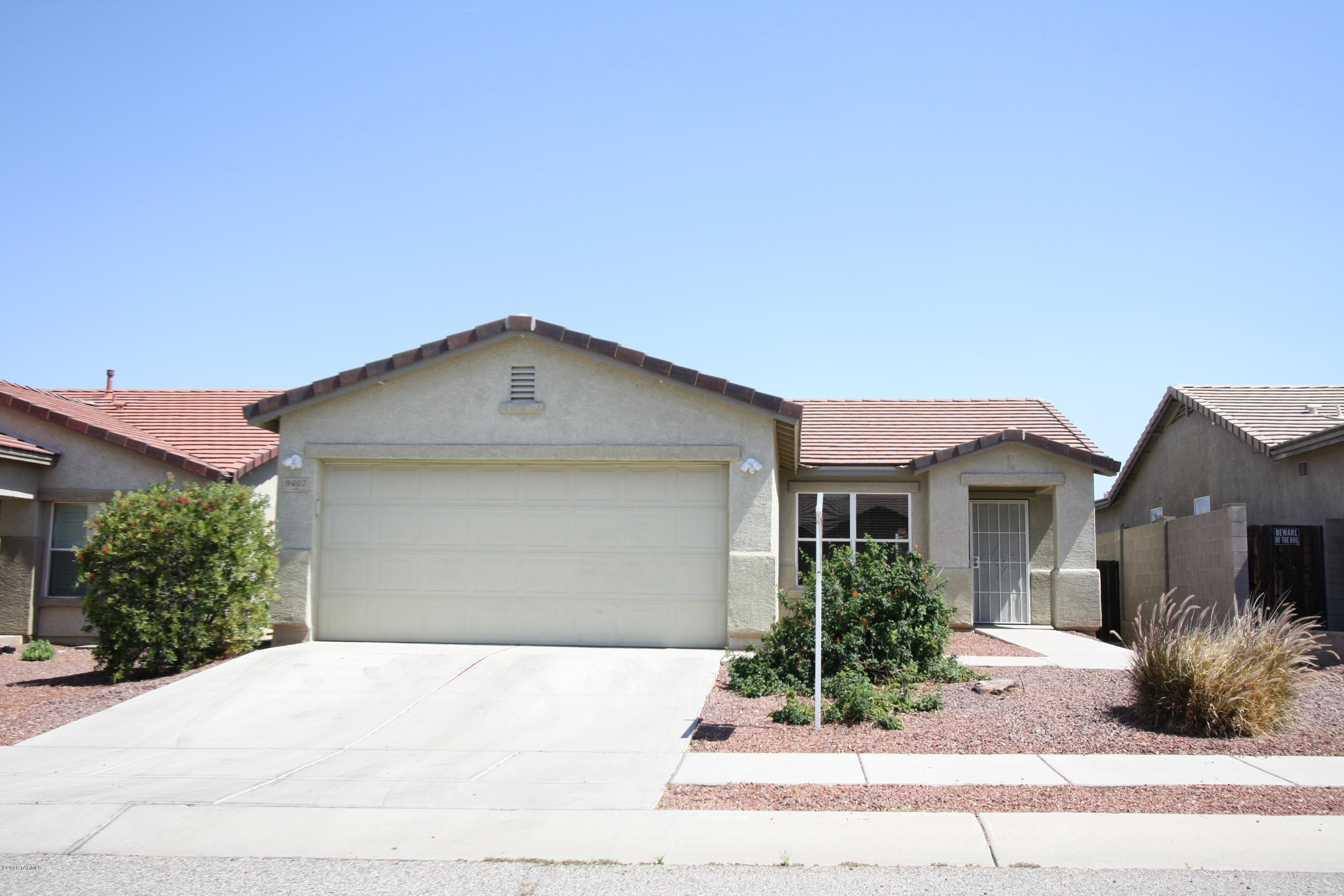 *Tenant occupied until 06/30/19*

Beautiful, newer 4 bedroom, 2 bathroom single family home on wide cul-de-sac street with sidewalks. Conveniently located near Supermarkets, shops, restaurants, parks, and schools, but tucked away from busy streets. Driveway with 2 car garage with built in shelves and extra storage space. Open/bright kitchen with eat in area. All appliances including washer/dryer and new dishwasher. Modern, open floorplan with ceiling fans in every room!  30 minute commute to Raytheon, 17 minutes to Davis-Monthan. Mountain views. Easy care flooring and neutral colors throughout. Spacious Master Suite with private bath featuring double sinks in large vanity. Fenced, private back yard with covered patio and your own Peach tree. Stucco exterior with tile roof.