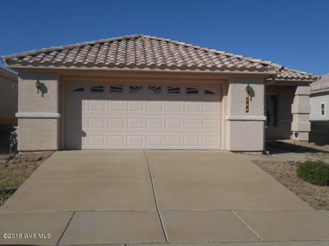 Here is that two-bed room, two-bathroom home with a den. A great room with a gas log fireplace to smuggle by in the winter. The master bedroom has a walk in closet and a sliding glass door that opens to the covered patio with some mountain views. This home has all the wanted features plus architecturally designed ceilings, side-out cabinets and even a pantry. Please be quick!