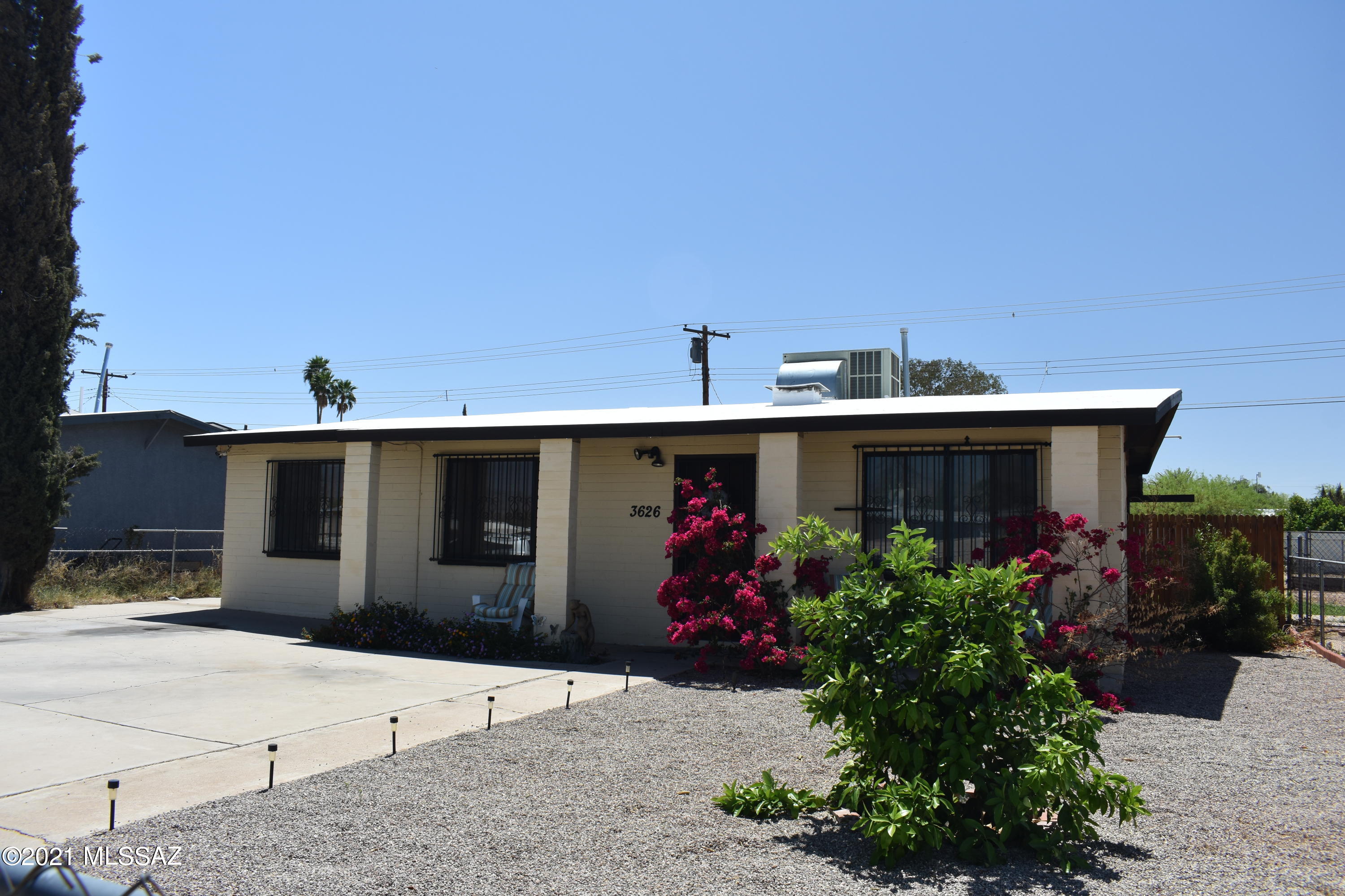 Welcome to this beautiful home, situated on a large lot. Plenty of parking for the home. This home boasts 2 bedrooms, 1 full bath,  a living room, dining room and kitchen and lots of updates! 
The sellers have remodeled with new tile, backsplash in the kitchen, enclosed the laundry room, put up a wood fence, replaced the roof (2020), water heater (2021), new sink and toilet in bathroom, and newly painted interior Come take a look!