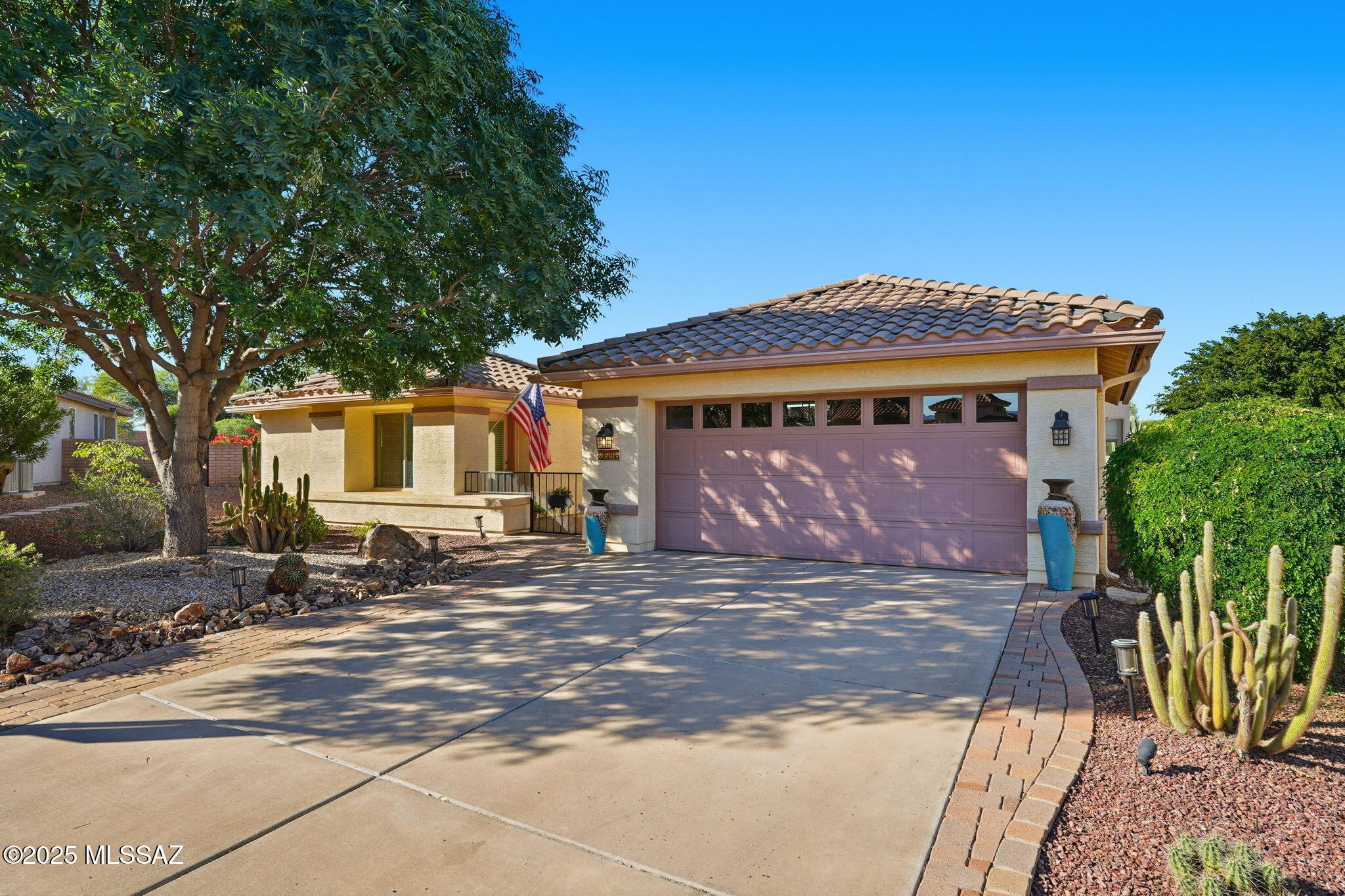 This stunning home in the sought-after Quail Creek community truly has it all! A charming brick paver courtyard welcomes you through a decorative wrought iron gate, where you'll discover a full guest casita and a cozy seating area—perfect for enjoying your morning coffee in peace.
Step inside to an open-concept floor plan with soaring ceilings and tasteful updates throughout. The beautifully appointed kitchen features solid surface countertops, custom pull-out drawers, a stylish tile backsplash, breakfast bar, and sunny breakfast nook—ideal for both everyday living and entertaining.
The spacious primary suite offers wood-look ceramic tile flooring, a beautifully updated bathroom, a large walk-in closet, and a handsome barnwood-style sliding door for added privacy. A versatile den opens to the main living area, creating a bright and airy space for relaxation or work.
Step outside to your private backyard retreatan entertainer's dream! Enjoy the built-in outdoor kitchen, tranquil fountain, and extended covered patio. A brick paver walkway leads to a second fully equipped casita, currently used as a state-of-the-art woodworking shop. This flexible space would also make a perfect home gym, hobby studio, or private office. The 4 ft extended garage gives you plenty of space for your larger vehicles or room to add your golf cart!  
Living in Quail Creek means enjoying world-class amenities in a resort-style setting. Residents have access to a championship 27-hole golf course, two fitness centers, sparkling pools, pickleball and tennis courts, creative arts studios, and an elegant clubhouse with dining and social events. With 24-hour gated security and a vibrant community spirit, Quail Creek offers the ultimate active adult lifestyle in the heart of Green Valley.
Don't miss your opportunity to experience luxury, comfort, and communityschedule your private showing today!