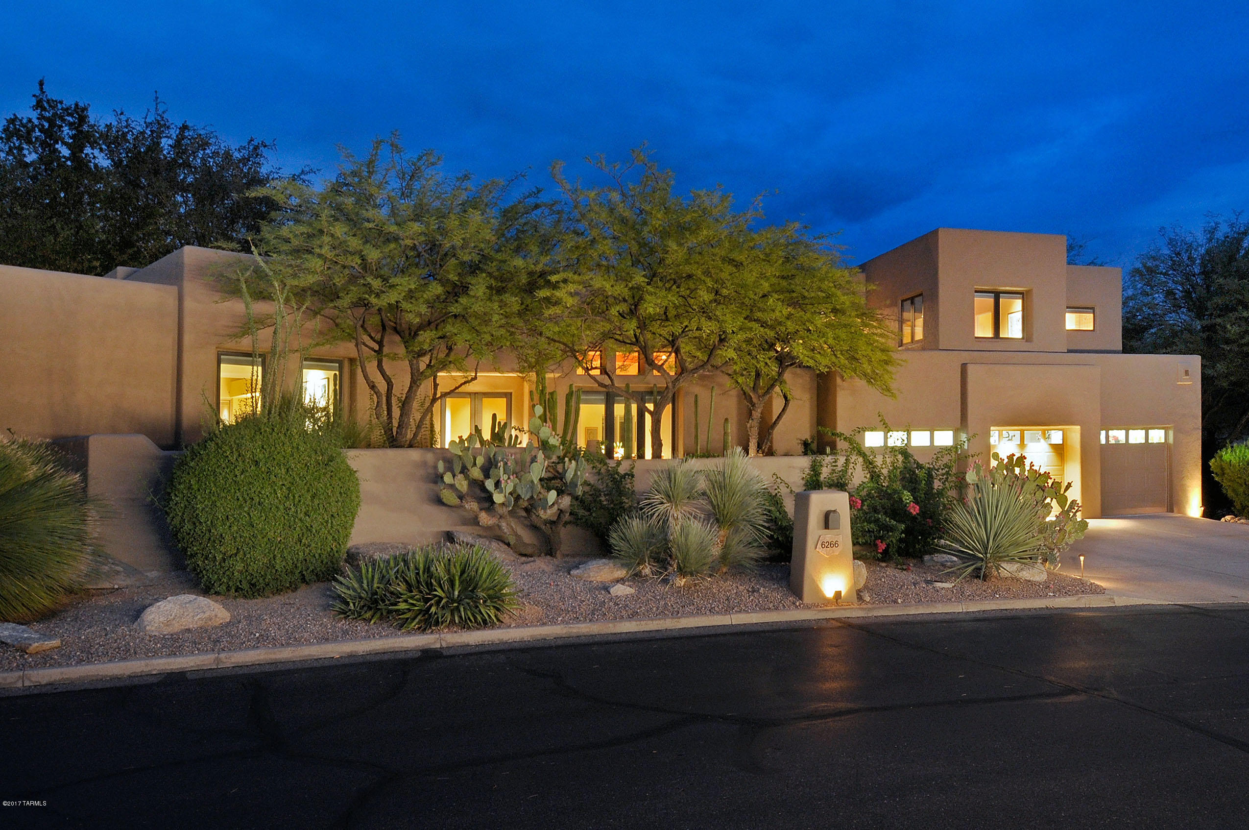 Stunning Remodel in Ventana Canyon! Well Maintained 4BR/4BA Custom Home w/All New Baths,Kitchen,Travertine Flooring,Custom Paint and More! New Kitchen Features Granite Counters,Opalescent Subway Tile Backsplash,Oversized Island,SS Appliances,Custom Cabinets & Stylish Light Fixtures, All Opening to a Family Rm w/Stacked Stone Fireplace.New “Lounge” Rm w/Custom Cabinets,Granite Bar,Wine Fridge & Ice Maker.The First Floor Master Suite Features Private Office,French Doors to Outside,Spacious New Bath w/Free Standing Copper tub,Custom Cabinets,Granite Counters & Glass Rain Shower.Upstairs Features 2 Guest Rms w/City & Mtn Views,New Jack & Jill Bath,Loft & 2 Balconies. Pella Windows & Doors,3 Car Garage.Private Backyard,w/New Synthetic Grass,New BBQ,Pebble Tec Pool & Spa! 3D Floor Plan avail