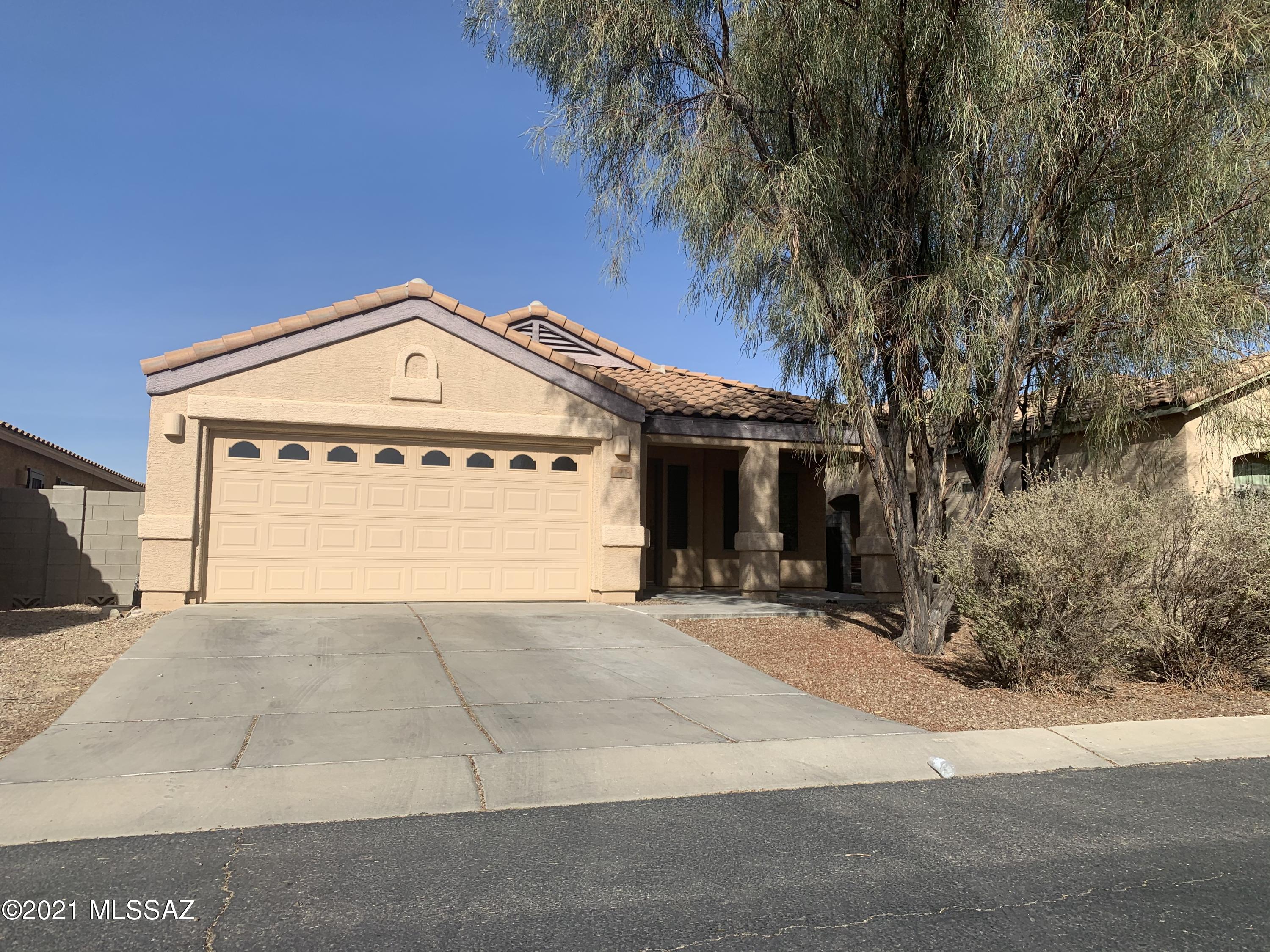 6615 East Cooperstown Drive Tucson AZ. 4 bedroom 2 bath all electric home in the Vail school district.  Gated community with a community pool. Formal living and dining room. No dogs. No washer or dryer included.