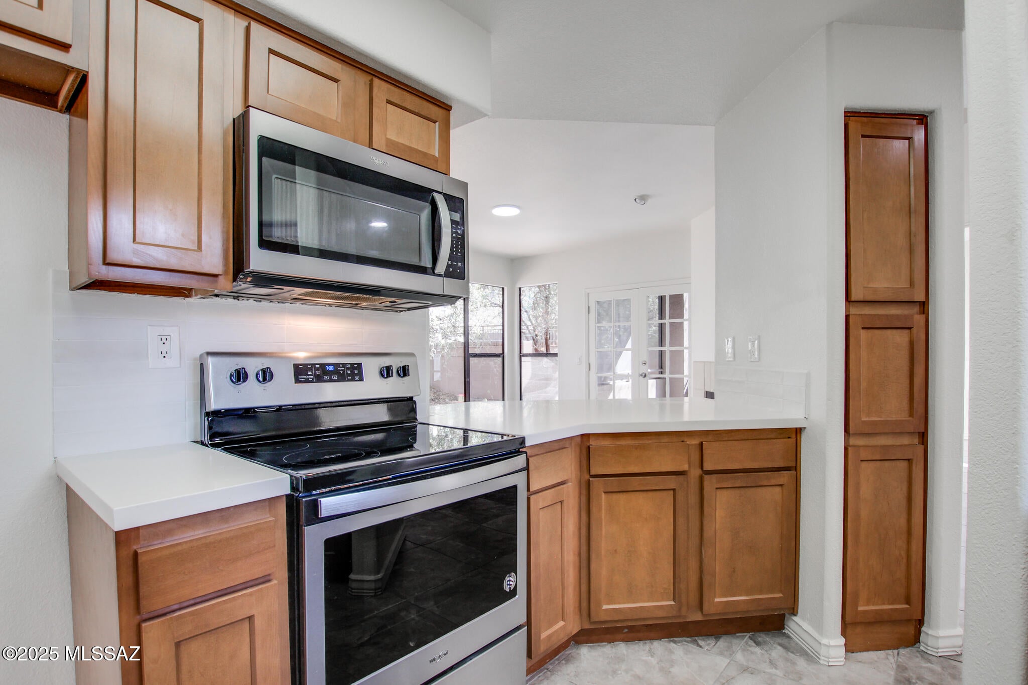 New Listing Alert!   Ground-level condo updated with a modern interior design. Located in the prestigious Catalina Foothills, Canyon View at Ventana Canyon offers luxurious condominium living with breathtaking views of the Santa Catalina Mountains. Walking distance to the award-winning Loews Ventana Canyon Resort and its two semi-private, 18-hole Tom Fazio-designed PGA golf courses. Sabino Canyon Park, high-end shopping, and fine dining are easily accessible, making this an ideal location for a full-time residence, vacation home, or rental property. A wealth of amenities, including two large heated swimming pools, spas, a tennis court, direct access to the Ventana Canyon hiking/walking trail, exercise facility, business center, 2 clubhouses, BBQ area and more!
