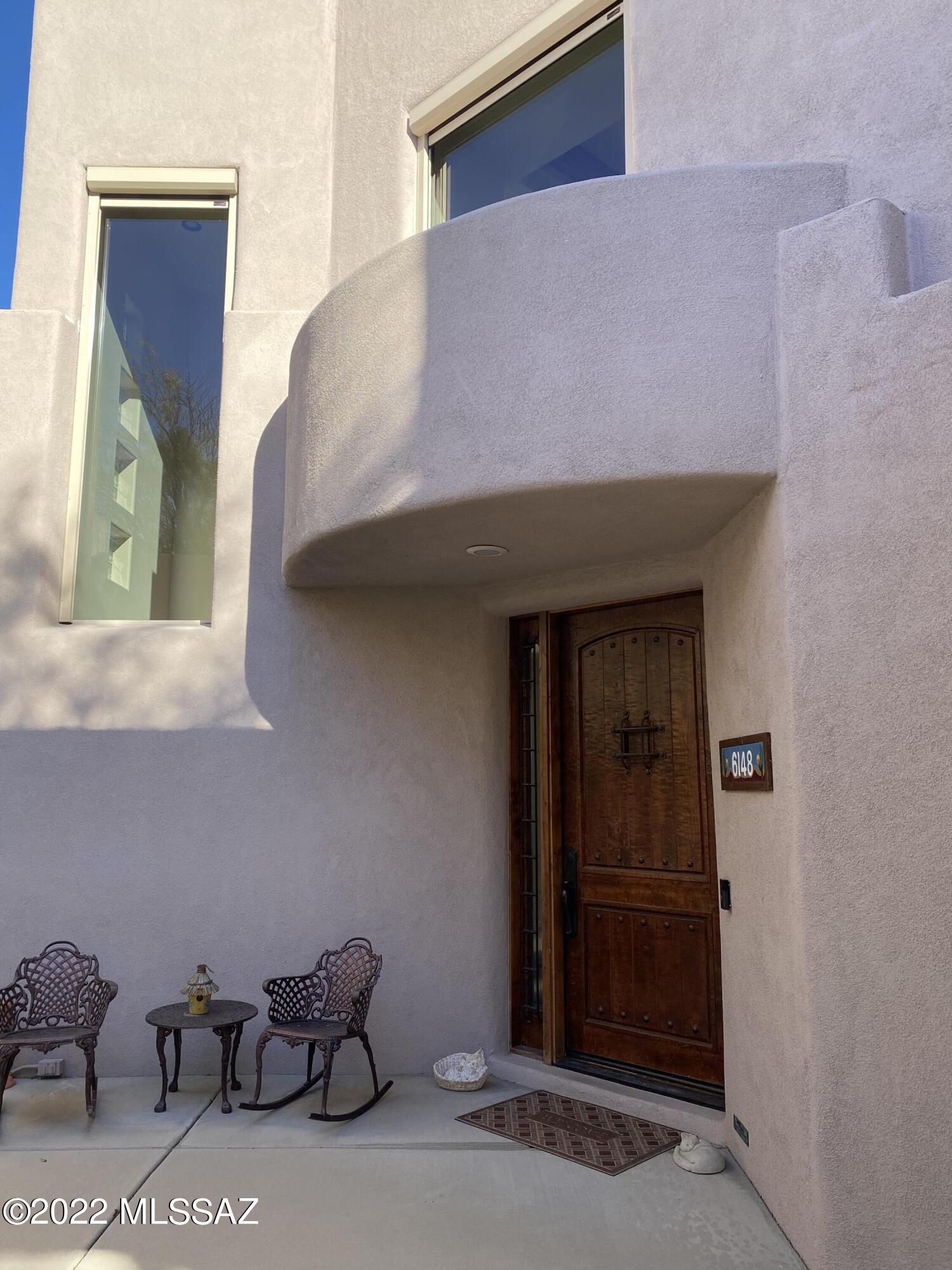 Lake front property w/ sweeping golf course, Mtn & city views. Yes, lake side in Tucson! On the renowned Ventana Canyon golf course, this property is sited to capture the beauty of the Catalina Mtns, golf course & lake complete w/ ducks & tortoises. The 3BR/3BA masonry home has a separate 1 BR/1BA casita joined by a lovely gated center courtyard. The great room features soaring ceilings, beautiful stacked stone FP & nearby office w/wet bar & formal dining room. The kitchen boasts a large center island, SS appliances, slab granite & a breakfast room w/built-in cabinetry. Spacious primary suite w/balcony overlooking the golf course, 2 guest suites & laundry are upstairs. Enjoy Tucson living at its best in the east-facing covered patio w/built in BBQ, cozy FP, sparkling lap pool & hot tub.