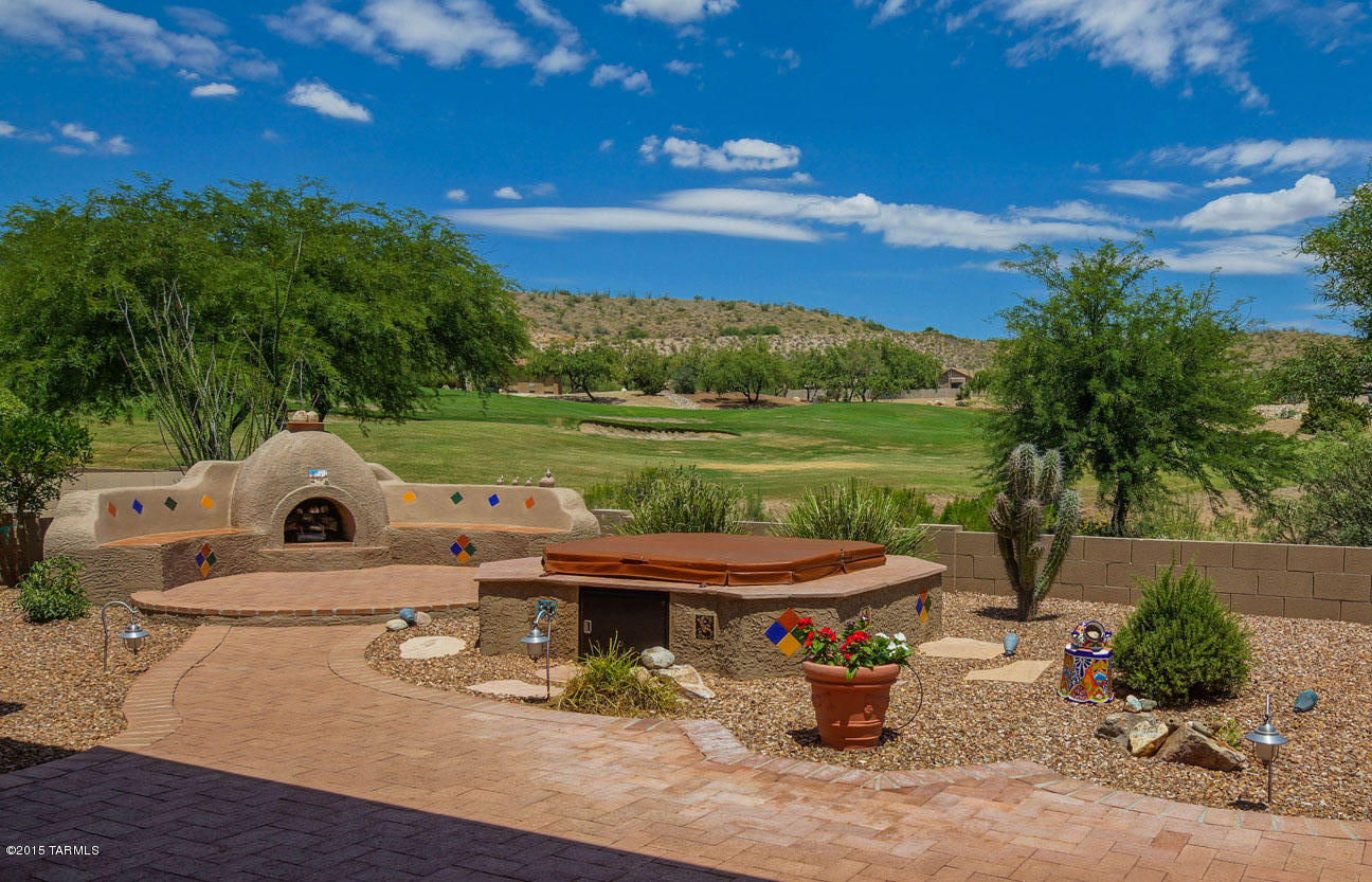 Welcome home! You MUSE SEE this energy efficient spacious and upgraded Luxury Series Dakota. This home is better than new and features exceptional amenities, i.e., instant hot water, Low E-windows, LED lighting, wide plank bamboo flooring, vaulted ceilings, etc. Open private backyard with golf course green, tall trees and mountain views. One of the best locations and sought after neighborhoods (Unit 27) in Saddlebrooke and is MOVE-IN ready.