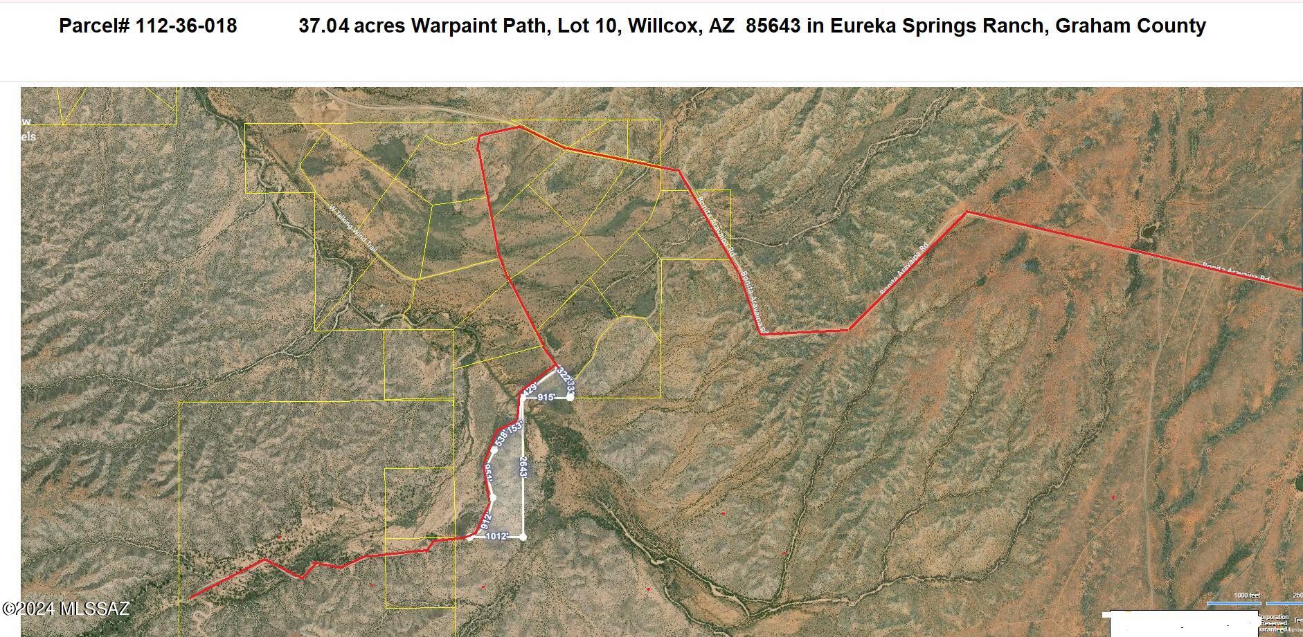 This 37.04 acres is a fantastic piece of property that of course is full of all those majestic views that Eureka Springs Ranch has to offer.  It is unique in its shape that offers flat, rolling, hills and valley that are so worth coming out and exploring.  The road runs down one whole side of the property so it gives you plenty of areas to put a new driveway or two in to lead to your new home and play destination.  The other side of the property is backed up to state land.  A small amount of the property is located in a flood zone which is around the Aravaipa creek that attract the local cows.  Drive on down and take a look.