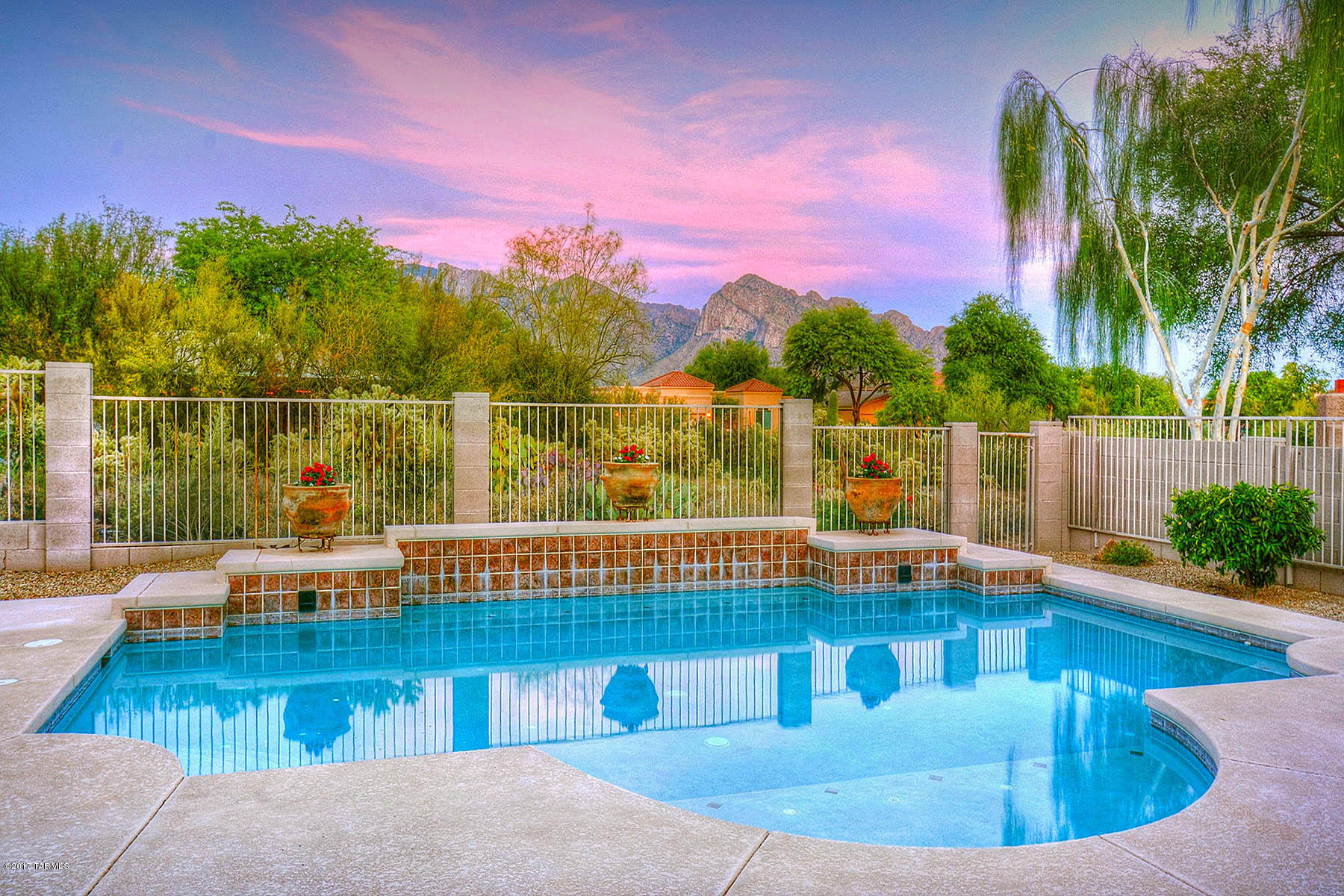 VIEWS! VIEWS! VIEWS! IMPECCABLE & COMPLETELY UPDATED 3 bed, 2 bath, 3 CAR Garage Single-Story Home located on a Very Private OVERSIZED LOT in the HIGHLY DESIRABLE ''Desert Vista'' Neighborhood!  This Property has FANTASTIC Lush Landscaping & is Perfectly Situated Backing COMMON AREA w/FABULOUS Catalina Mountain and Sunset VIEWS!  Split Floor Plan w/High ceilings & ''Lots and Lots'' of Natural Light! BRAND NEW Wood & Ceramic Flooring & Designer Paint Throughout!  GREAT ROOM w/Cozy Gas FP! Gourmet Cook’s Kitchen offering FABULOUS Granite Counters, Stainless Steel Appliances, and Plenty of White Cabinets.  The Master Suite offers a LUXURIOUS Soaking/Garden Tub, separate shower, Large Walk-In closet & Dual Vanities.  The Backyard is SIMPLY AMAZING & is Perfect for Entertaining! Welcome Home!