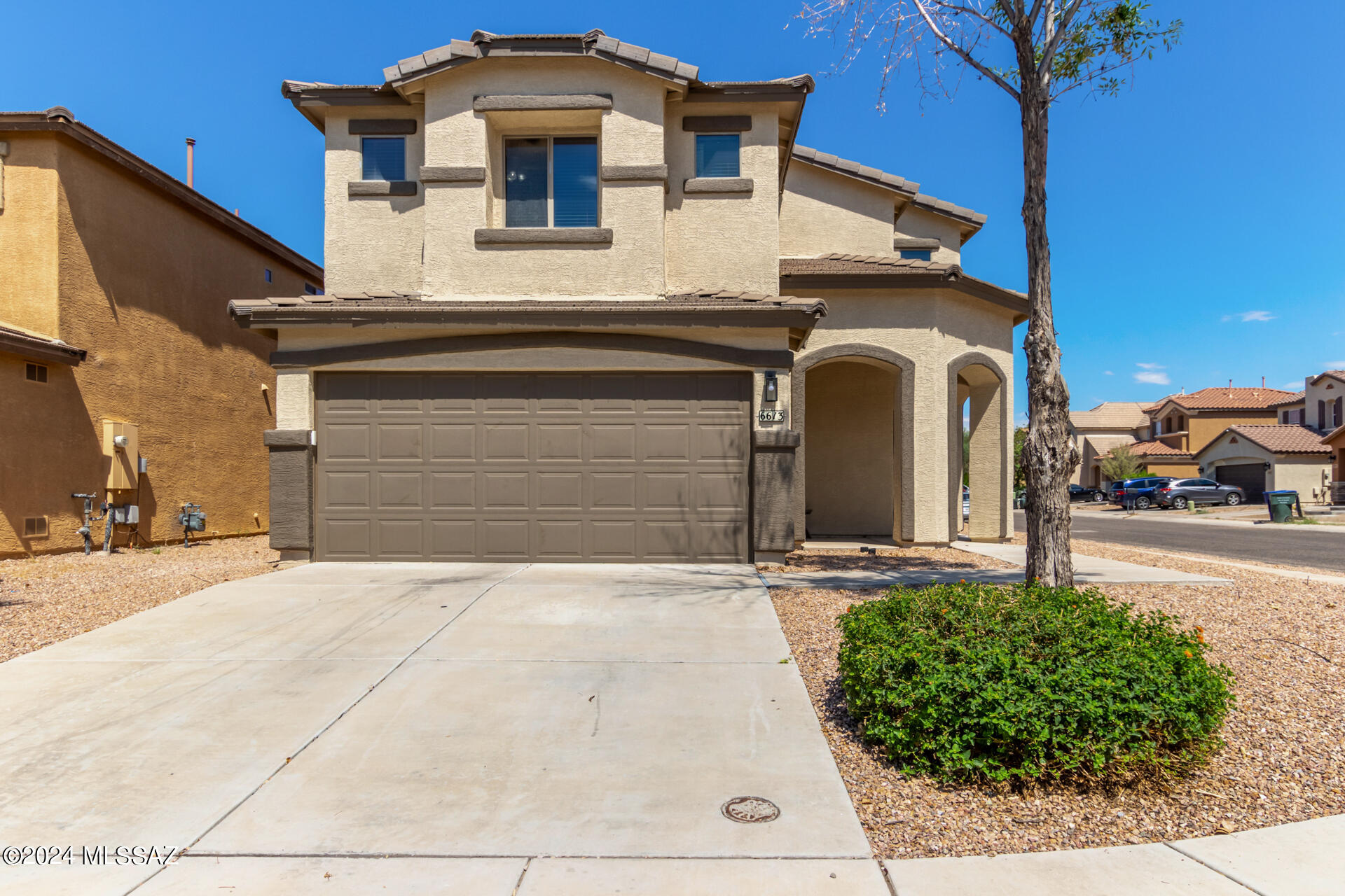 Beautiful home with lots of updates and great location close to I-10, DMAFB and Tucson Airport! This home boosts 3 bedrooms, 2.5 baths and a loft/bonus room! There is a spacious family room great for entertaining with gas fireplace, open kitchen which looks through the dining area to the backyard. There are beautiful grey oak floors, granite countertops and white cabinets throughout the home with matching black hardware, light fixtures and black appliances that add a stylish touch. Upstairs the master bedroom has vaulted ceilings, a walk-in shower and huge master closet along with 2 additional bedrooms and a loft/bonus room for even more space! Fully covered patio & grass which is perfect for kids & pets! *W/D included. Small pets allowed; $250 non-refundable pet deposit/$25 mon pet rent*