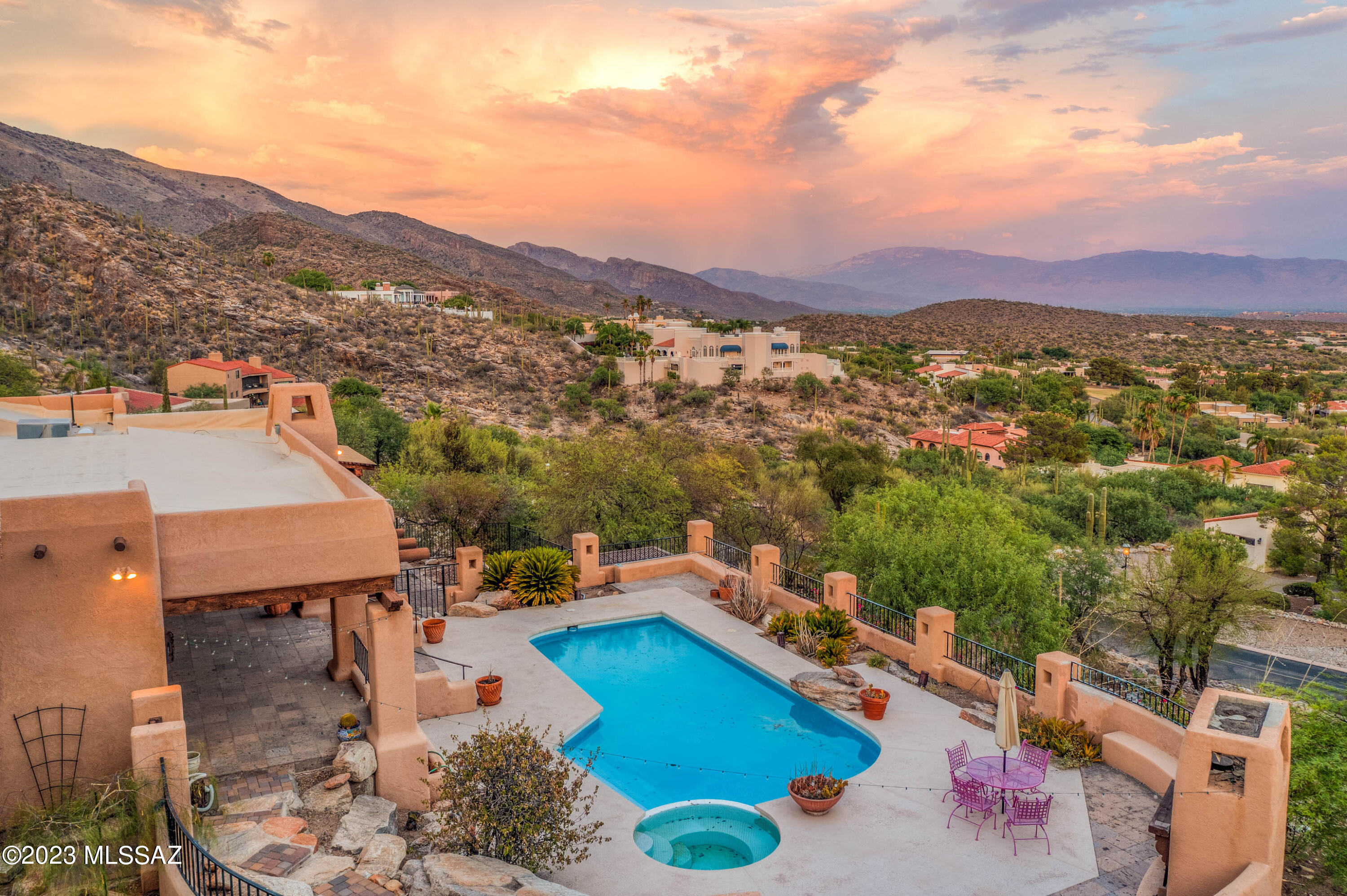 SWEEPING VIEWS & CITY LIGHTS!
Sitting on 4.3 acres at the TOP of Skyline Country Club Estates, you will have nearly panoramic city and mountain views like no other! Drive up the charming cobblestone drive to this classic and unique soft Santa Fe home built with charm and quality craftmanship through-out! Just some of the home features are, 5 CAR GARAGE, PELLA wood clad windows and sliding doors, large & bright and open living areas, high ceilings and exposed beams, hardwood floors, 14 in. + thick masonry stucco walls, wide hallways, wonderful outdoor patios, hand crafted built-in cabinetry and doors, charming kitchen with Wolf appliances, wine cooler, warming drawer, and a gas beehive fireplace., custom solid mesquite carved entry & interior doors, wide grand entry, 4 fireplaces.... Pool has just been re plastered. new gas line to house just installed.
