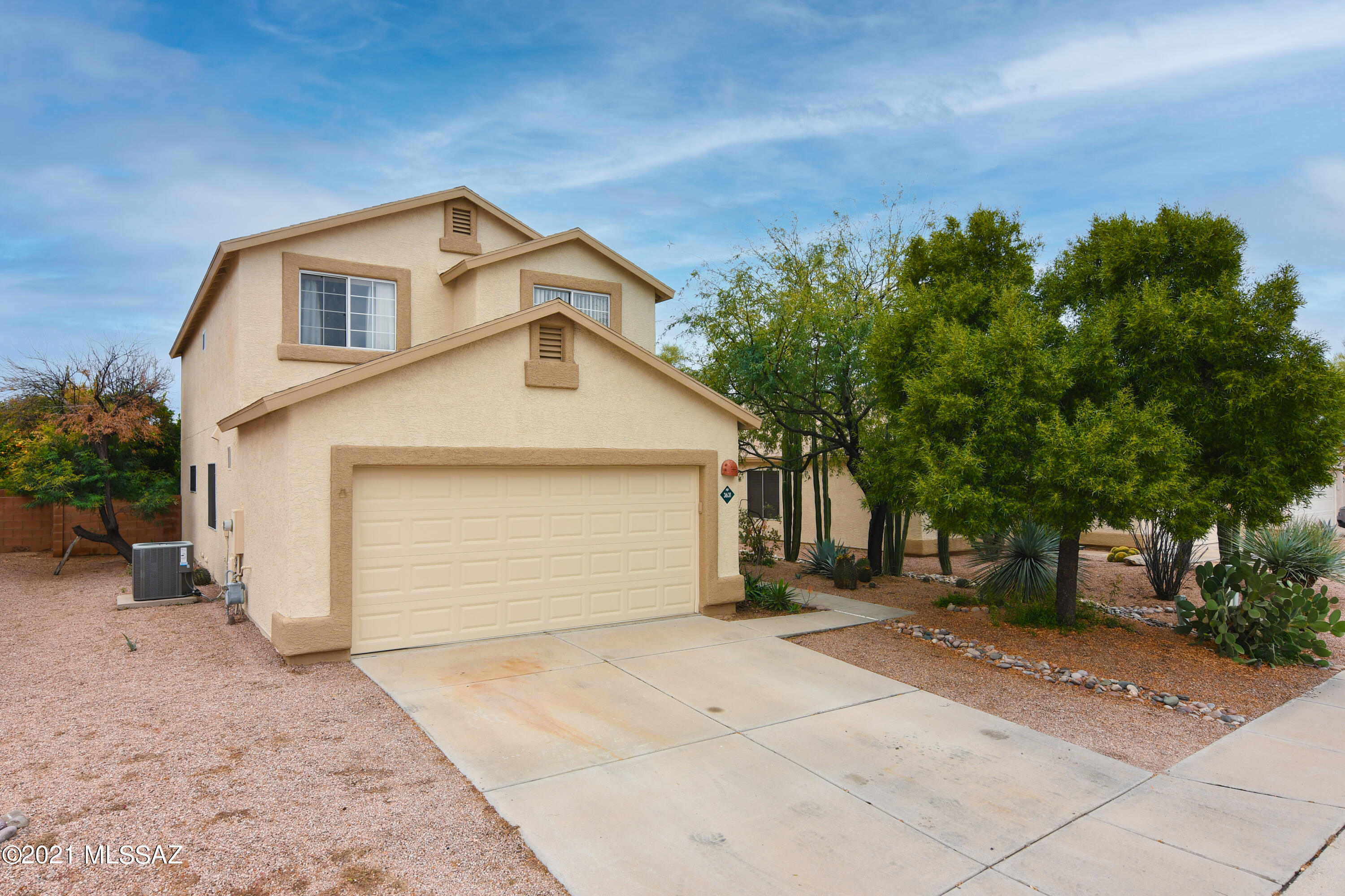 Wonderful Northwest Tucson Home with an Extremely Private Zen Garden Backyard. Kitchen with Stainless 5-Burner Gas Range & Breakfast Bar. Sunny Breakfast Nook Overlooking the Lush Yard. Open Family Room. Living & Dining Rooms for Entertaining. Gorgeous Tile Flooring Throughout the Main Floor. Spacious Owners Suite with Walk-in Closet & Ensuite Bath with Soaking Tub & Separate Shower. 3 Additional Bedrooms, Den/Game Room, Full Bath & Powder Room. Fabulous Outdoor Living Space with Full Length Covered Porch, Koi Pond with Cascading Water Feature and Garden, Citrus Tree and Fenced-in Pet Friendly Yard. New Exterior Paint, Roof 2015, Garage Door 2021. AC Unit 2017, Prime NW Tucson Location Near Shopping, Entertainment & Restaurants with Easy I-10 Access. Meticulously Maintained Move-in Ready.