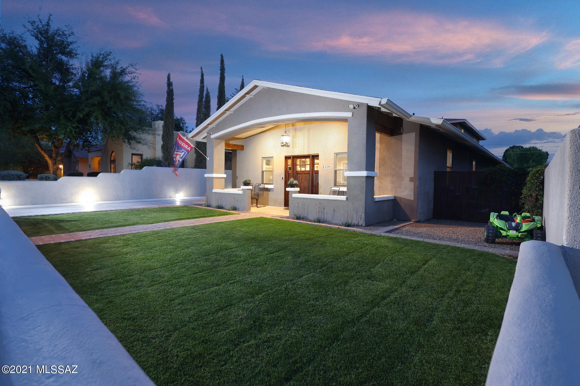 Captivating Craftsman Bungalow in Sam Hughes built 2013. Authentic design meets unrivaled modern amenities (including 3  car garage) & finishing touches. 4Br/4Bath main house plus 1Br/1Bath (separate entry), above garage,  guest  quarters w/kitchenette & own off-street parking. Chef kitchen w/ custom cabinetry and gorgeous countertops, top-notch stainless appliances & island w/breakfast bar. Kitchen opens to outdoor dining area w/wet bar (beer tap & wine cooler). Impeccable master suite (walk-in closet & extra closet space-Calif. Closets). Master Bath w/double vanity sink, walk-in shower & beautiful tub. Large basement w/entertainment area & Br/Bath.  Guest quarters periodically used as Air B & B.  Great location--blks to UofA & city trolley.  1 seller is a Az. licensed real estate agent.