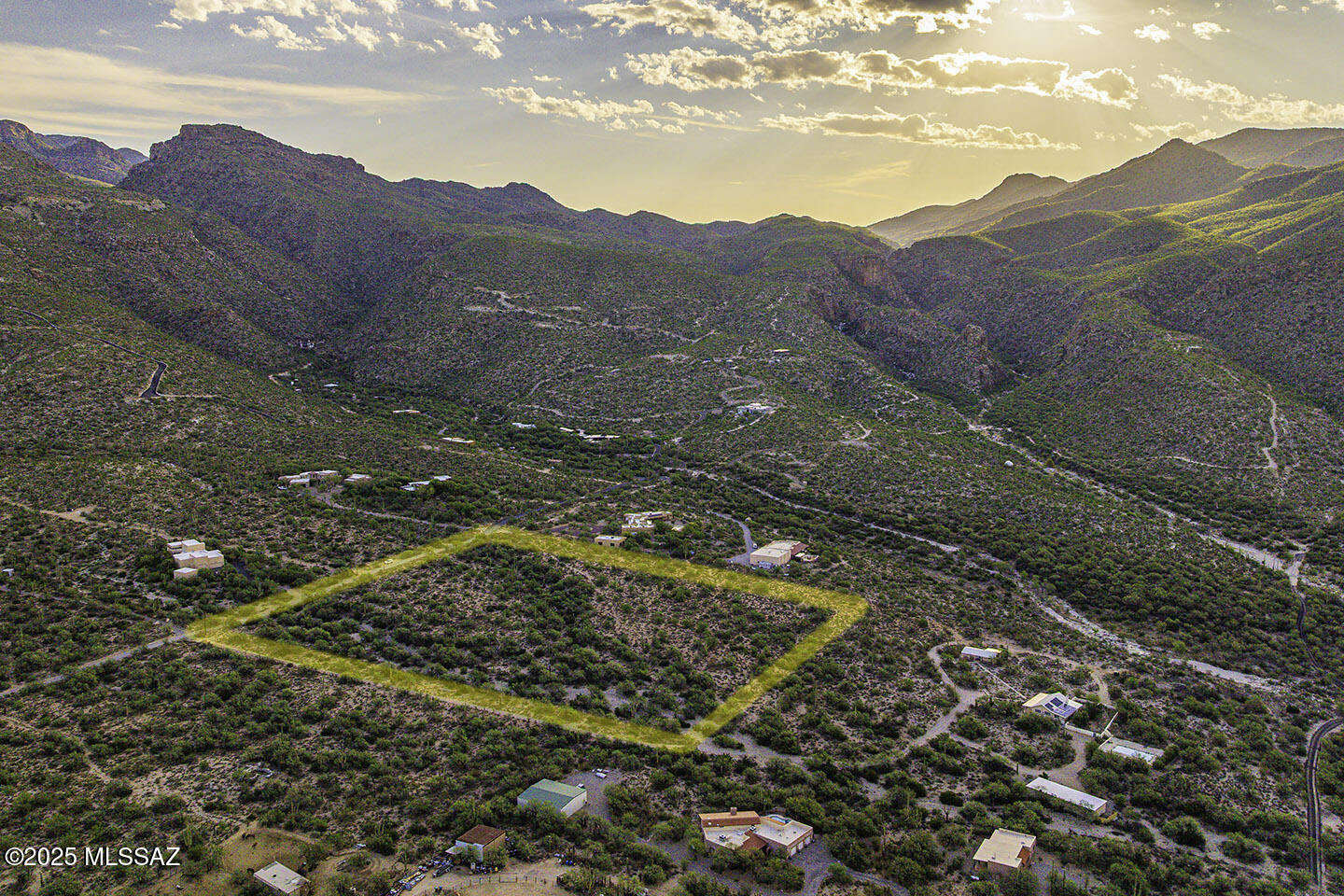 Located in the serene Agua Caliente neighborhood of Tucson's highly desirable Tanque Verde Valley, this beautiful 10-acre parcel offers the perfect blend of privacy, natural beauty & opportunity.  Enjoy peaceful rural living surrounded by scenic desert landscapes & endless outdoor recreation, just minutes from Agua Caliente Park, Molina Canyon, Agua Caliente Canyon & the scenic route to Mt. Lemmon. Ideal for hiking, horseback riding or simply soaking in the beauty of the Sonoran Desert. The lot is largely flat & mostly usable, with breathtaking views of the Catalina Mountains, dramatic canyon backdrops, brilliant sunsets & star-filled night skies. The property features an abundance of mature saguaros & native desert vegetation, creating a truly picturesque setting. Zoned SR, (Suburban Ranch) with a min lot size of 3.31 acres, there is potential to split the property, buyers should verify with Pima County for specific development opportunities.
TEP Electric pole on property line.
City of Tucson Water service map says available, property line or close by.  Buyer to verify with City of Tucson Water if available.
