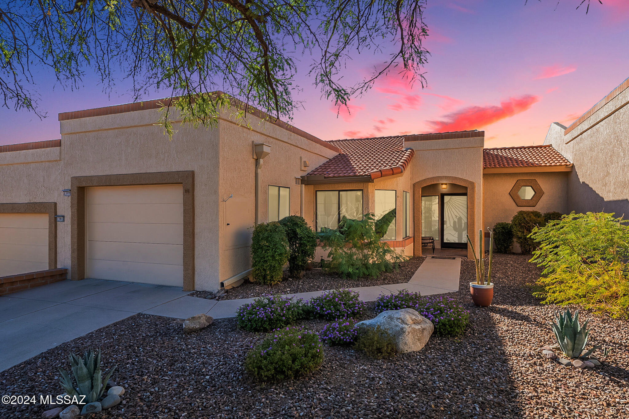 Welcome to this comfortable Patio TOWNHOME situated in Sun City Oro Valley. Its SPLIT bedroom design offers two-bedrooms, two bathrooms. Bright and Large Owners Suite.  The guest bedroom w/ MURPHY BED used as a den, craft, or media room with a total of 1,049 square feet of living space situated on a private lot with 0.06 acres. The home features a mindful layout offering LARGE KITCHEN high ceilings, ceiling fans and tasteful Southwest features accentuating this home. The outdoor covered patio offers open space for privacy.  Turn-Key Option