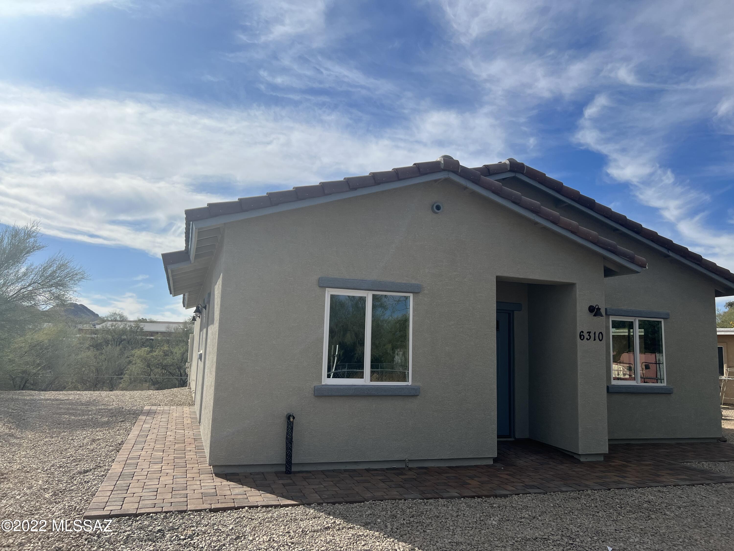 New Construction Home. Beautiful 3 bedroom 2 bath Located close to shopping, restaurants and easy commute to I-10. Great way to own a new home! Beautiful Granite Counters through out home. Plenty of space to add carport or maybe even build a garage. Listing agent is licensed in the state of Arizona and is related to seller.