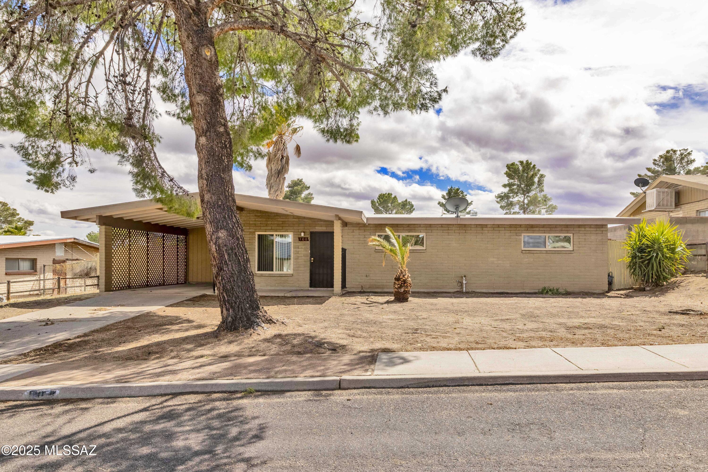 Charming 3-Bedroom, 2-Bath Home - No HOA! This home features 3 spacious bedrooms and 2 bathrooms, with updates including updated windows and air conditioning for year-round comfort. The backyard includes 2 sheds, offering ample storage space for all your needs.  Jacuzzi in the back yard is inoperable and conveys with the home. All appliances are included.