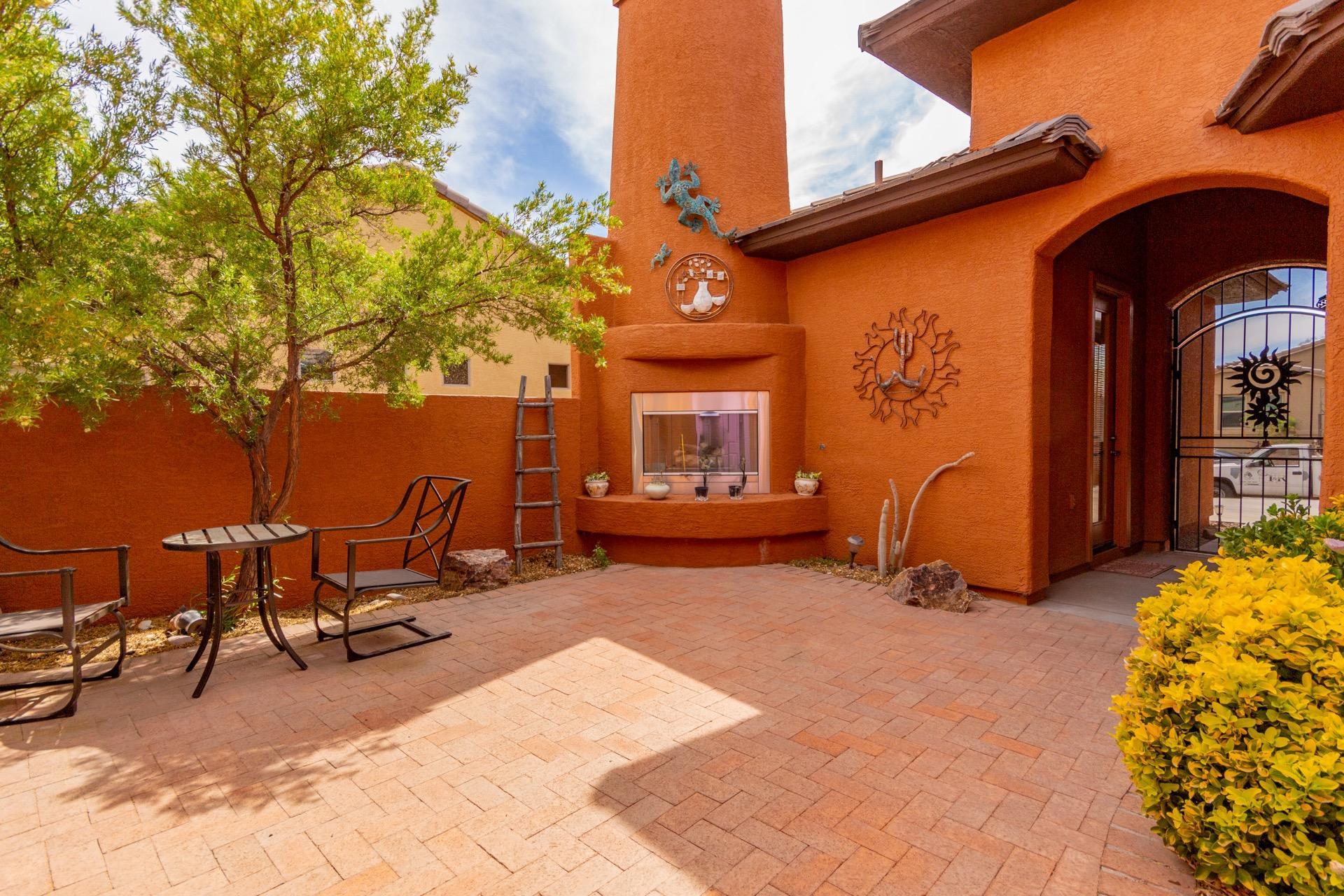Ranged Priced-Seller will consider offers  $400k-$420k. Sensational Home in the Gated Community of Canoa Ranch. Casita & Courtyard for outdoor entertaining w/an exterior fireplace & backyard covered patio. Breathtaking Mountain views. Spacious open floor plan, charming tower foyer entry, cozy fireplace, media alcove, & warm palette. Handsome tile floors, formal dining room w/French doors to the patio, upgraded lighting, & window shades. Center kitchen island, stylish counters, breakfast bar, SS appliances, pantry, breakfast area, & plethora of wood cabinets w/hardware. Perfect gathering place for family & friends. Built-in desk! Generous size bedrooms, ample closets, 3 baths, & an interior laundry room. Master retreat boasts patio access, walk-in closet, & a private en suite w/dual sin