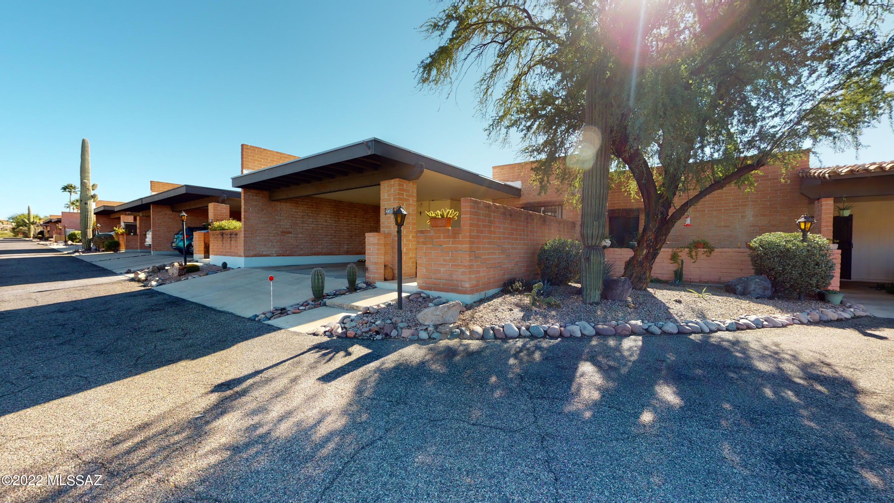 Enjoy Catalina Mountain views in highly desirable Foothills Scool Distric,  Tierra Serena neighborhood. Lovely 2 BR/2BA, townhome features spacious kitchen, large owner's suite with walk-in closet, ceramic tile thru out, NO Carpet. Shaded & enclosed patio with additional storage room. Cul De Sac location, a variety of fruit trees and backing to common area make this home a private retreat. HOA covers water, roof, garbage and exterior maintenance. Community features pool, spa, tennis court & rec center. Close to shopping, fine dining, hiking and so much more! Listing Agent is related to Owner.