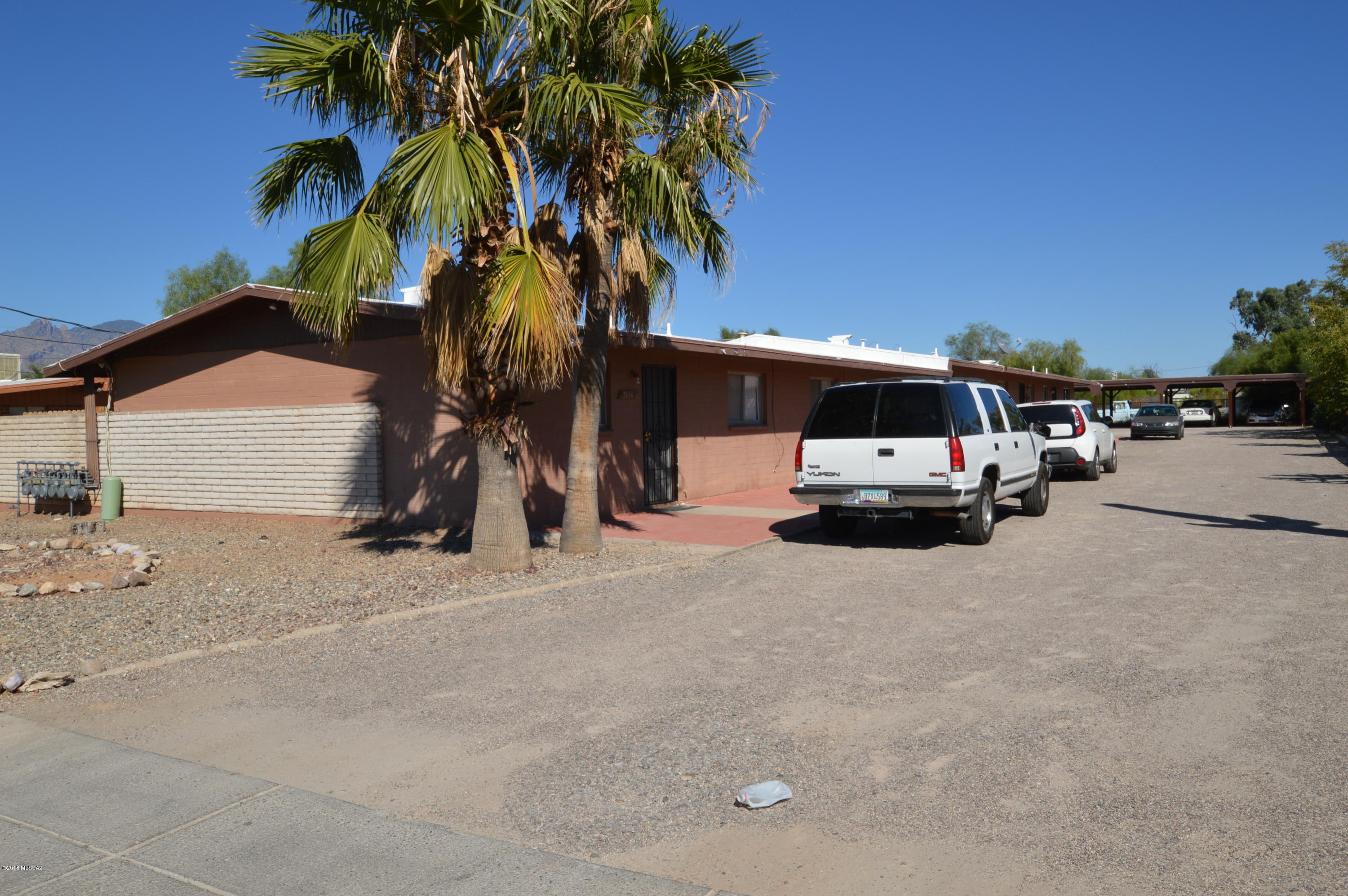 Fantastic unit in central Tucson. Close to UA, schools, shopping and transportation. Open floorplan with spacious living areas. Ceramic tile throughout! Larger bedrooms. Dual paned windows and central AC! Private fenced yard with storage. Assigned carport and onsite laundry. Clean, quiet and comfortable! This little gem wont last long, so Call TODAY!!