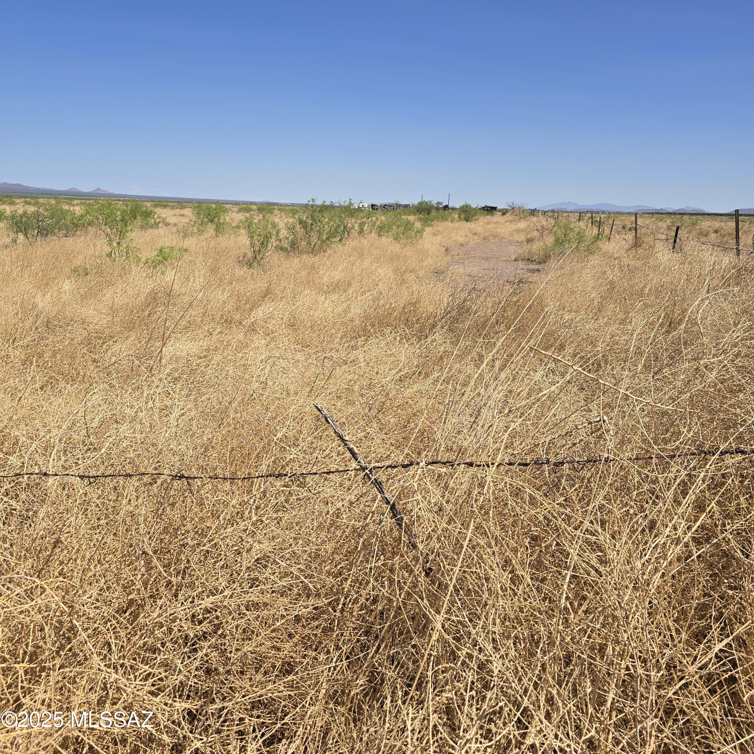 Prime 81-Acre Rural Parcel in McNeal, Arizona - Wide Open Spaces & Development Potential - AS-IS Sale
Discover endless possibilities on this expansive 81-acre parcel of pristine, wide-open land in the peaceful rural community of McNeal, Arizona (Cochise County). Perfectly positioned off Central Highway with direct access via the newly paved Hopkins Road, this property offers easy year-round access and stunning panoramic views of the surrounding high-desert landscape.
Zoned RU-4 (Rural - 4-acre minimum), this versatile designation supports low-density rural living and self-sufficiency. Ideal for homesteading, off-grid living, livestock, gardening, or building your custom dream home (including owner-builder options with minimal restrictions in Cochise County). The property provides the space and freedom to create your private retreat or investment holding in one of southeastern Arizona's most serene areas.
Key features include:

Two existing wells on the property (recently inspected - both determined to require redrilling for reliable use).
Sold strictly AS-IS, with the seller possessing limited knowledge of the property and making no repairs or concessions.
No structures or improvements - a true blank canvas ready for your vision.

This rare large-acreage offering in McNeal is being sold AS-IS with flexible seller financing available: 25% down and seller may carry for up to 5 years on agreeable terms. Serious buyers are encouraged to submit offers accompanied by proof of funds or pre-approval.
Embrace the tranquility of Arizona's high plains, where big skies, open vistas, and quiet seclusion await. Whether you're seeking a homestead, recreational land, or long-term investment, this 81-acre gem delivers unmatched privacy and potential. Don't miss this opportunity in a market where large parcels with paved access are highly sought after!
Contact for more details or to schedule a viewing. Offers welcome!