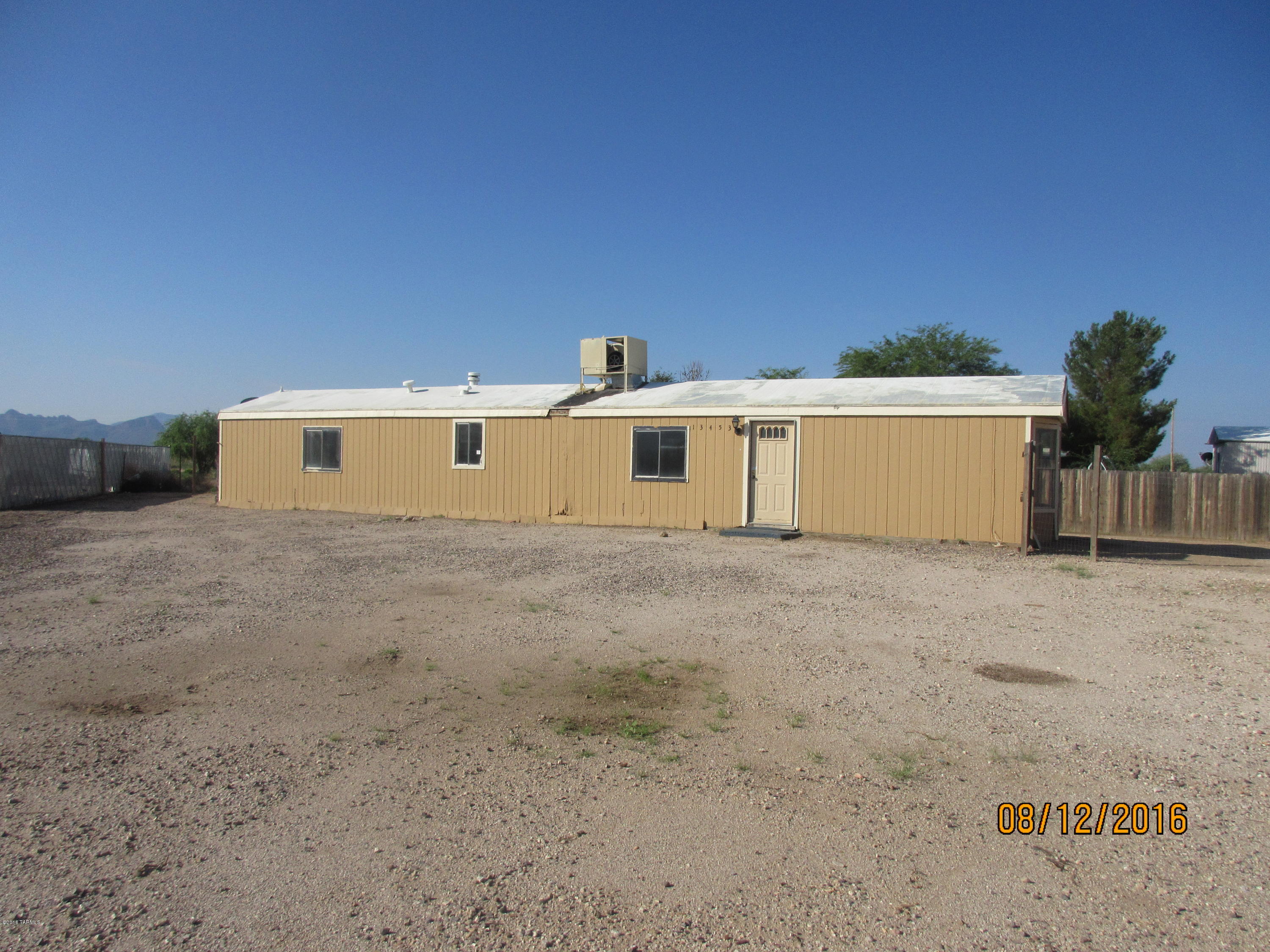 Fix up Manufactured home on large lot.