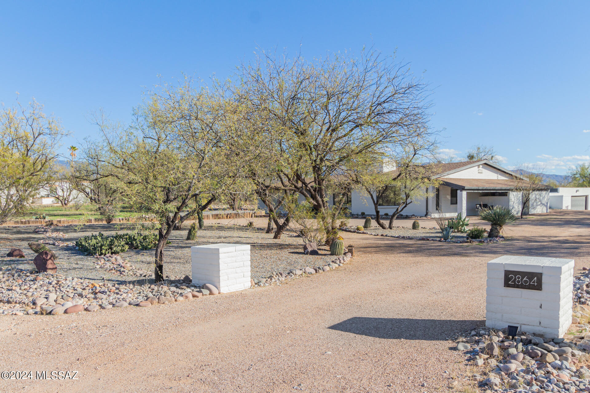 Seller will counter or accept offers between $779,000 and $809,000. This remarkable custom home is located in highly sought-after Northeast Tucson