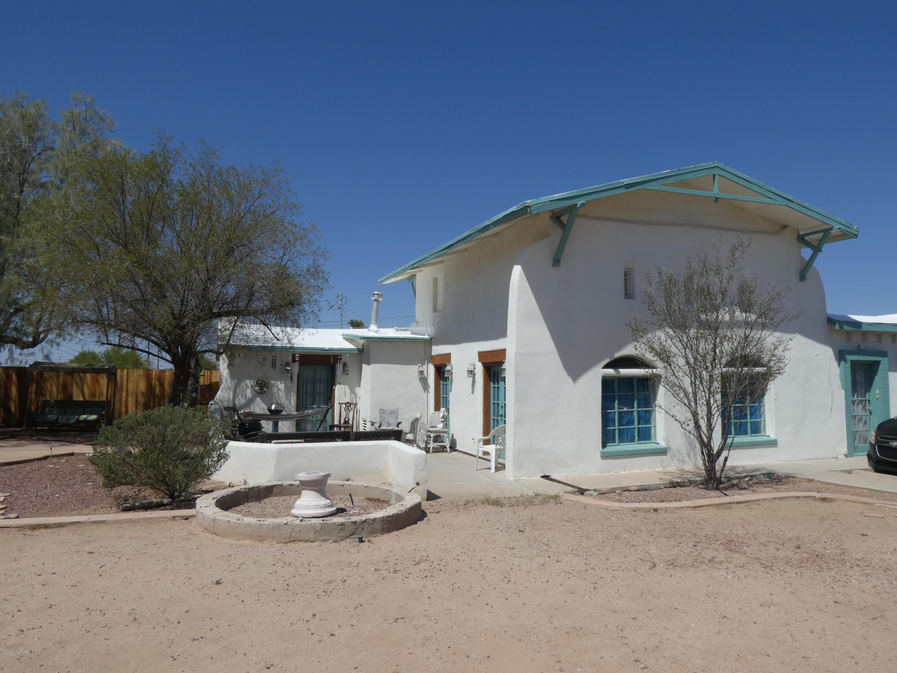 This Property Has a beautiful Historic adobe house. There are two Duplexes. First duplex: 3br/2bath and 2br/1bath. 2nd Duplex: 2-2br/1bath. Both duplex's has a washer and dryer hookup and storage room.  New roofs, No warranties not excluding Electrical, Plumbing, Heating, Cooling and Roofs. Property Has vacant land in back area with plans to build .  Utilities are paid by tenants.  Please escrow with Susan Raygoza at Stewart Title. Long term tenants.   Income is 4,150.00 mthly