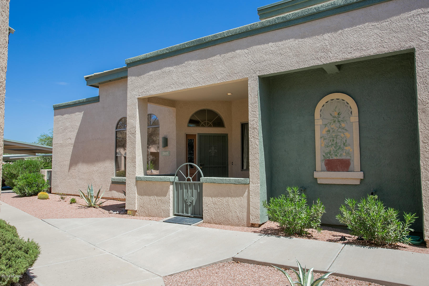 Excellent condition 2BR/2BA Home in an Adult 45-55+ Gated Community. Vaulted 14' Ceilings. Pot shelves. Blk walls on 2 sides for Privacy and Utility Savings. 2x6 Steel Construction, post tension. N facing Patio,Security Pre-wire & Cust doors. Close to Malls, Hospitals. Short distance to Park, Library and YMCA. HOA includes:Water, Garbage. Tile Roof, Bldg Maint. Common areas, Clubhouse/Pool/Spa. Gated and nearby dog park.