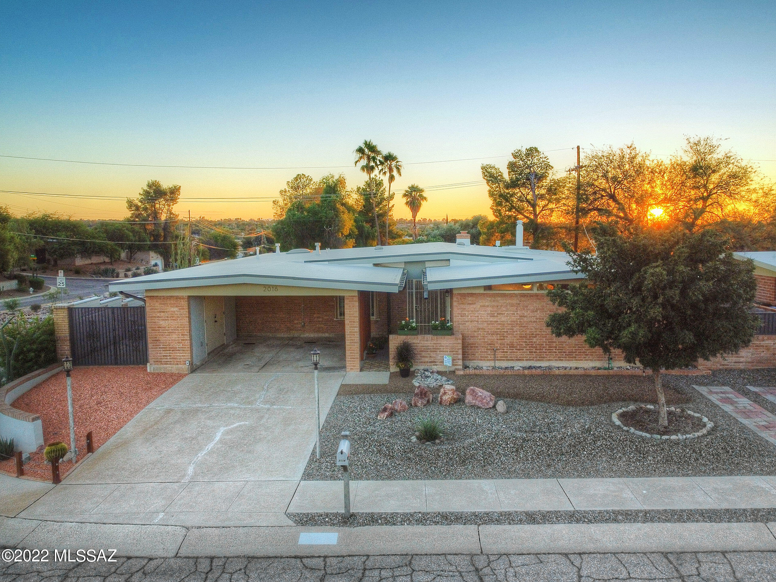 TAR Broker Tour Winner! Escape the conventional. This Home and The Views are Spectacular. Watch every sunset over the Golf Course 14th tee box from a spacious covered patio. Enjoy the calm and serenity inside with high ceilings and natural light. New A/C, furnace, energy efficient windows and doors. Versatile, open concept design with two living areas. Great Room, Two Primary Bedrooms and a Flex Space optimize the 2330 sq. ft. floor plan. Multiple home office, STR guest suite, and multi-gen living options. If you want peace of mind that comes with owning a solid build, completely updated home, schedule a tour and discover so many upgrades. New seamless gutters with rainwater harvest, Chef's Kitchen, 3 Generous Beds, 3 Baths and polished concrete floors. Top ''A'' Rated Marshall Elementary. 20 minutes to Tucson International Airport or Downtown Tucson. Main Primary Bedroom is a lock-off guest suite with separate entrance. Wi-Fi enabled Nest thermostat, B-Hyve irrigation and Hardwired Arlo monitoring. Abundant parking and secure golf cart, motorcycle or UTV space. All appliances, fixtures and equipment have been lightly used and meticulously maintained. Quality homes like this do not come along often. You can feel the difference the moment you walk through the front door. The home is truly one of a kind.