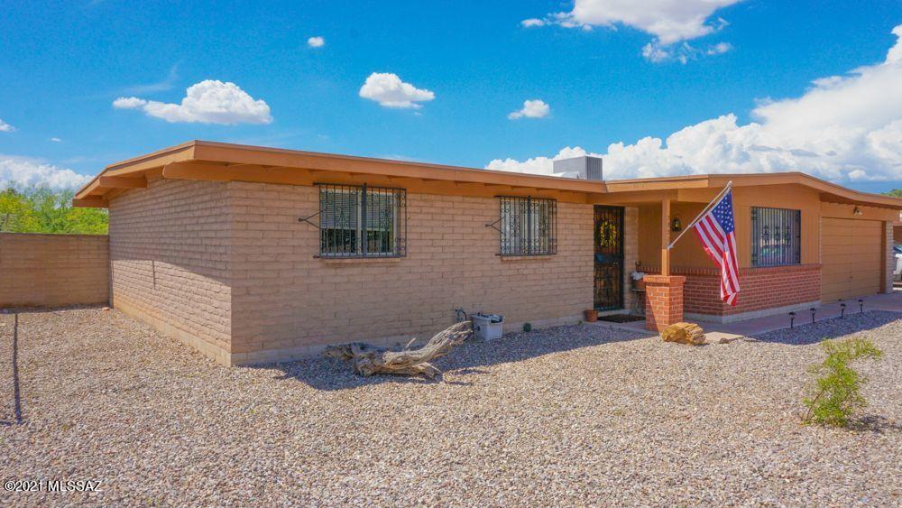 Nicely updated 3-bed 2-bath slump block home on a large lot, in a quiet east side neighborhood. Newer roof and A/C (2017). Large kitchen and living room. Extra space in garage for workshop. Large backyard features double gates for vehicle and 'toy' access. No neighbors out back. You'll have a front-row view of the annual Davis-Monthan Air Show! This gently lived-in home is very private and move-in ready. 
NO SHOWINGS FRI-SAT-SUN AUG 6-7-8 SINCE DOGS CANNOT BE REMOVED THEN)
