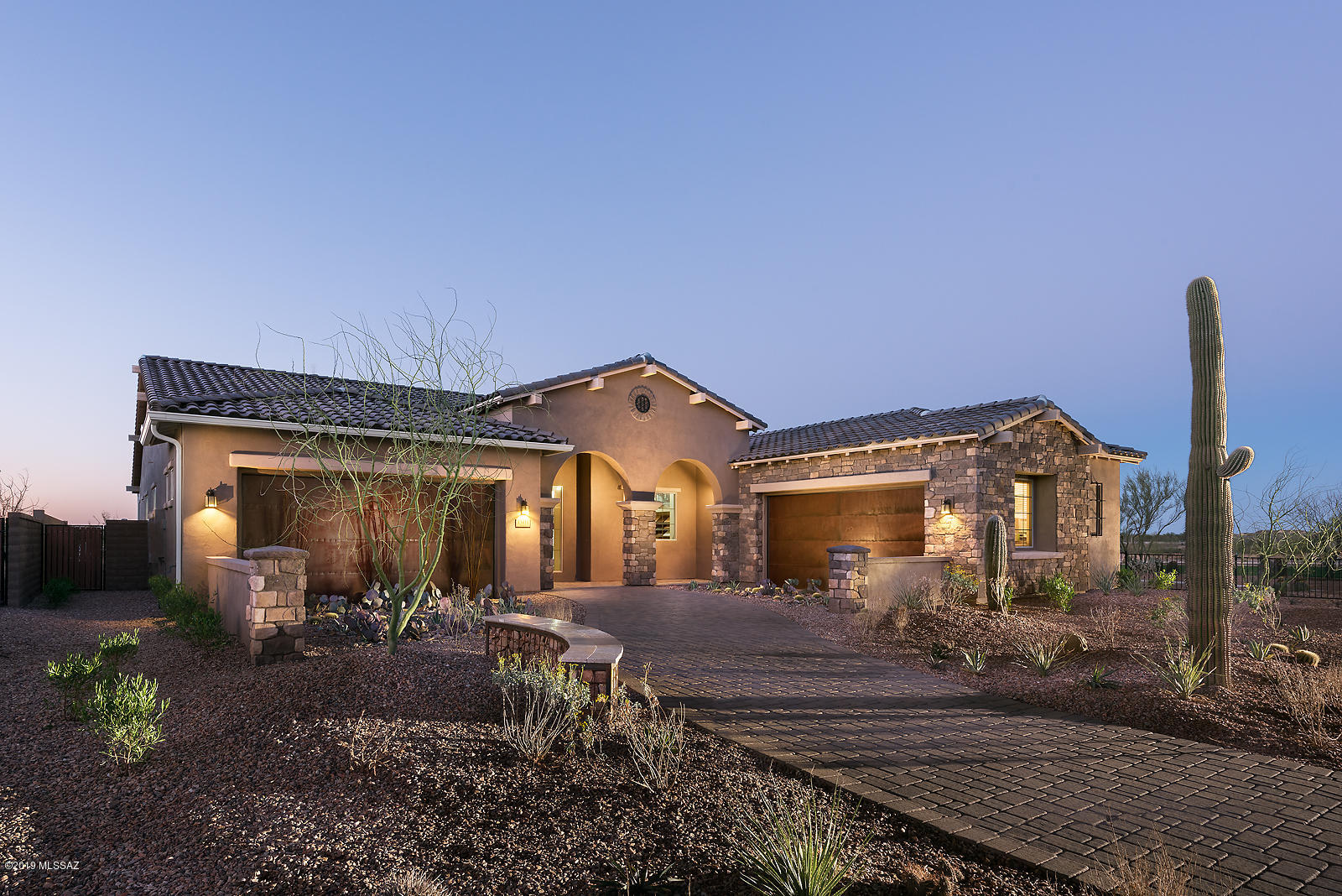 Delayed Close of Escrow to be on or before July 31, 2019 or earlier with 30 days notice at Seller's discretion.  Beautiful Model Home  with Tuscan Exterior located in Center Pointe Vistoso, a gated  community within Rancho Vistoso. This home features a Gourmet Kitchen with Stainless GE Monogram Appliances, Gas Cook top and Double Ovens, Quartz Kitchen Counter tops with Custom Tile Back splash, Painted  ''Silk'' Upgraded Cabinets,  LED Undercabinet Lighting, Pendant Light fixtures over Kitchen Island, 12' Coffered Ceiling in Great Room & Foyer, 16' Center Pull Slider at Great Room, Tile Shower Surrounds at Master Bath, Upgraded Carpet & Padding, Ceramic Tile Floors, Landscaped, Outdoor Fountain, Ramadas, Parks, Community Pool and so much more!