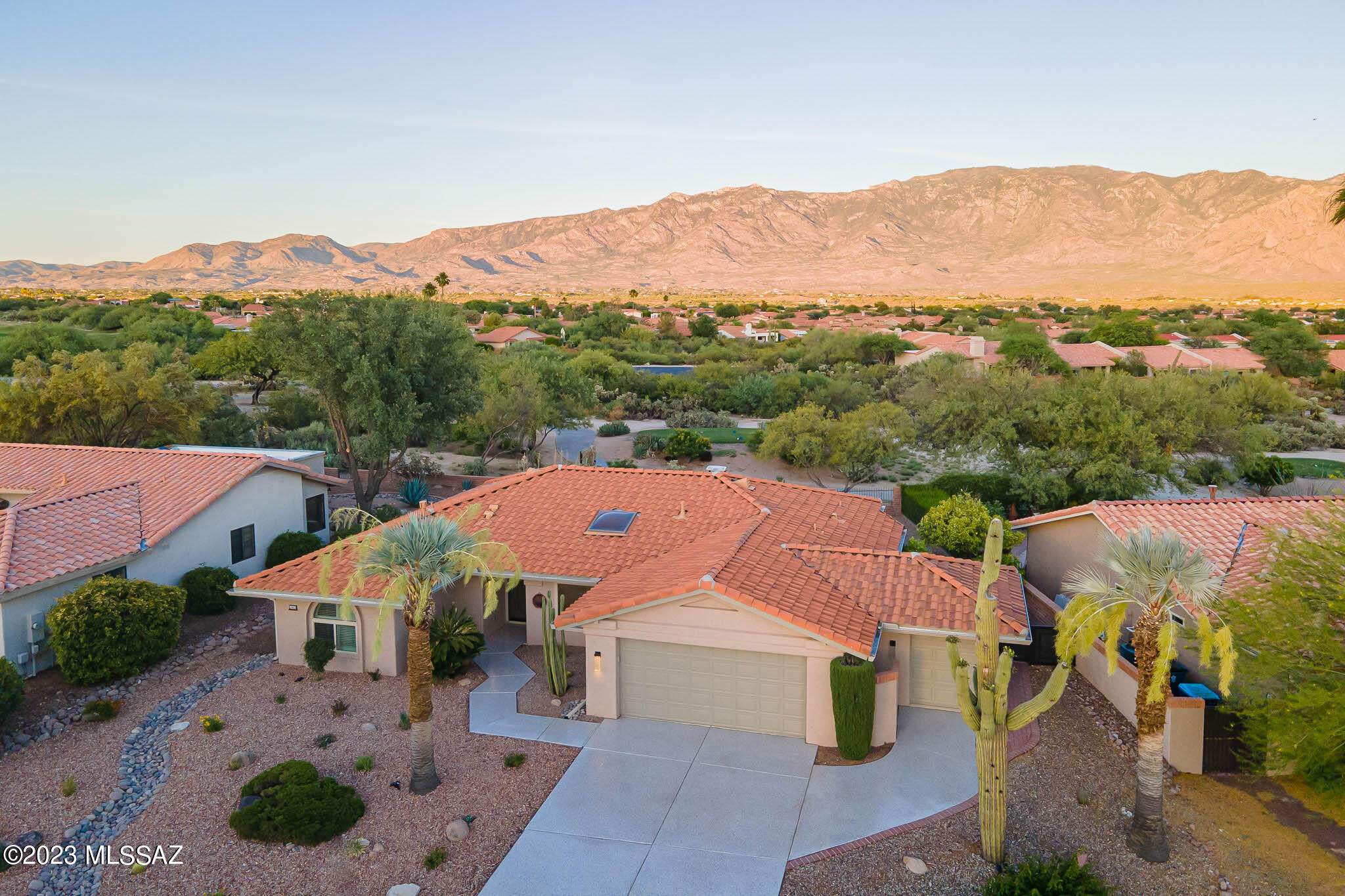 Fully Renovated and Modernized!  This 1632sq ft home in Sun City Oro Valley features 2 bedrooms, 2 baths and office/media room. The theme of wood, metal and stone come together to become the template for southern Arizona lifestyle living. The backyard looks straight up to Mt. Lemon and all the way down to Pusch Ridge with access to the 14-tee box on the Views golf course. You will be captivated by the open, bright and cool firm lines this home offers.  A true entertainer's delight.  The lovely warm Hickory cabinets standout with the quartz countertops and 90'' marble island with bilateral waterfalls making the kitchen a focal point. A Separate media room and Golf Cart garage round out the house everyone wants!