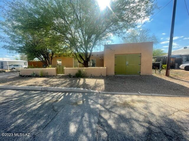 Great investment opportunity, priced to sell! Central fixer-upper 3 bedroom 1 bathroom bungalow. Newer tile floors. Large bedrooms and exposed beam ceilings throughout. Large yard and single car garage. Remodel started but not finished. R2 Lot w/room for guesthouse. Come see it before its gone.