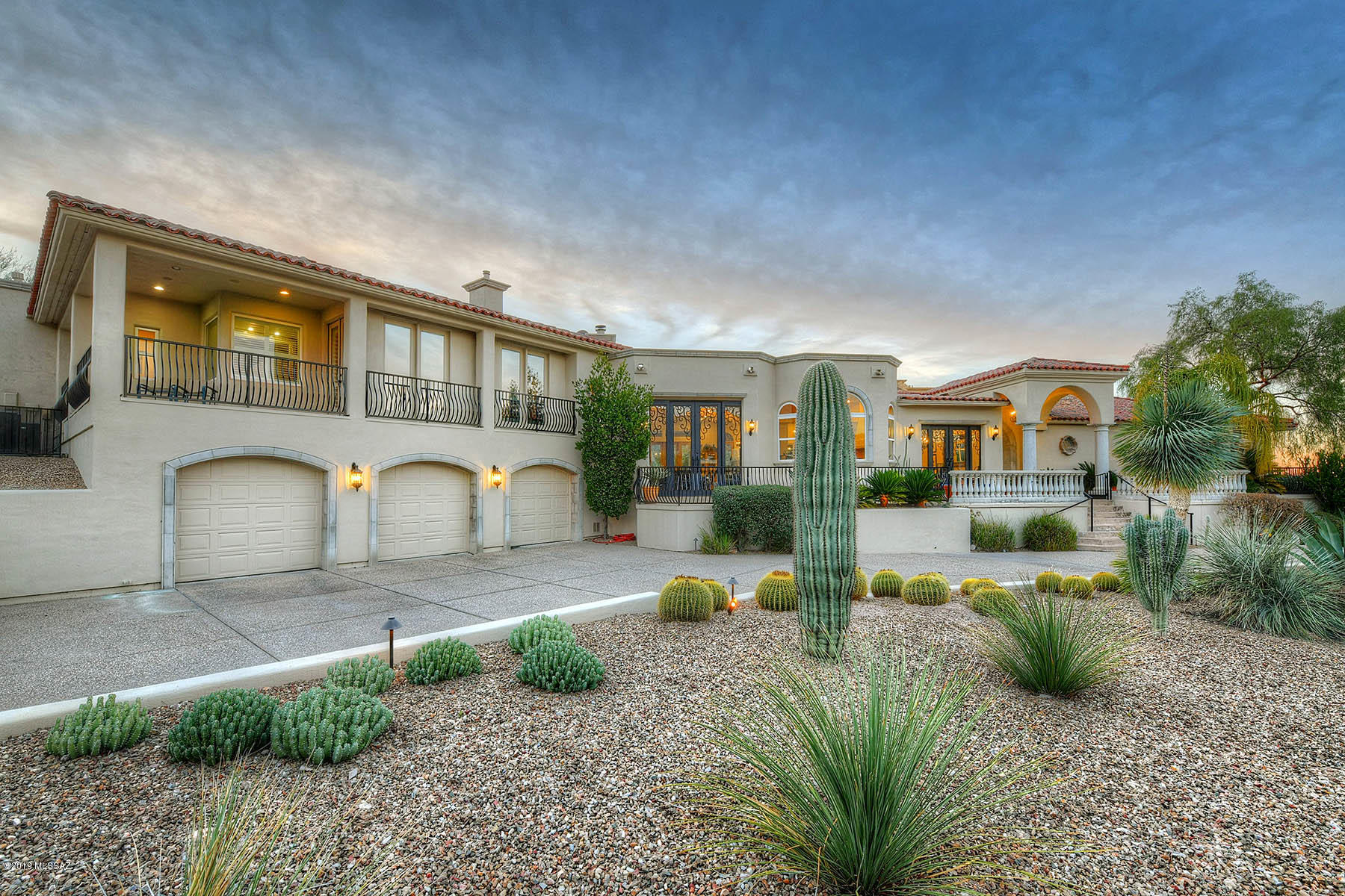 Spectacular Catalina Mountain views showcase this private estate located in prestigious Ventana Overlook. This custom Mark Soloway design offers unparalleled custom finishes while providing comfort, design & functionality. Exquisite Cantera  custom iron doors welcome you into the grand foyer & almost 7000 sq ft of a well appointed home keeps you wanting more. Points of interest include secluded master suite w/sitting area, fireplace & private balcony, game room, 6 seat media room & personal gym. Main living all on one floor includes generous living room w/ picturesque windows, gourmet kitchen w/ large island, Dacor double ovens, 6 burner cook-top. Retreat outdoors to the heavenly blue pool, spa & lush landscape, putting green & private Ramada captures breathtaking mtn views!