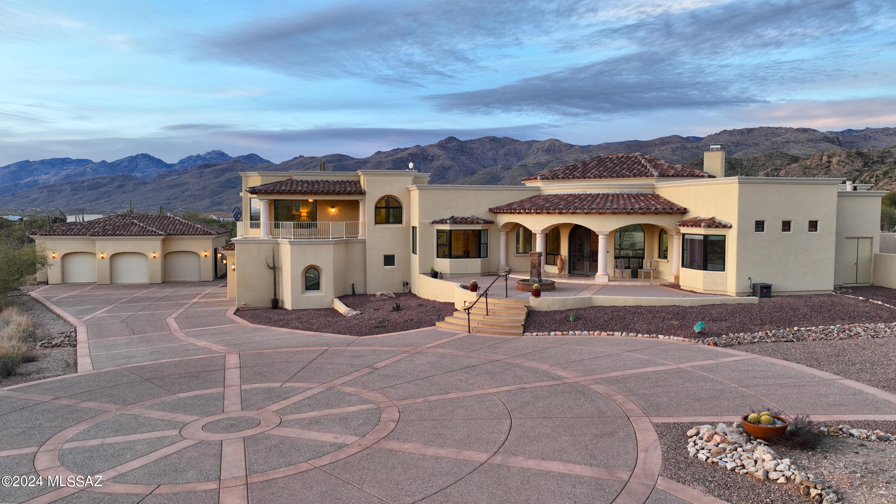 Spectacular home with 360-degree Majestic Mountain & City Views. This Gorgeous home has it all.  Located in a very special area near Agua Caliente Trail head, Views & Nature surround you. This 4520 square foot home offers 4 bedrooms, 4 baths, 3 Car attached garage, Separate building w/3 car Garage/Studio/Workshop & ½ bath along with a Resort like backyard with pool, spa and water feature. Stunning views greet you from every window of this Impressive home. Primary suite occupies its own floor & offers a private deck to catch some of the best Tucson Sunsets. All 3 guest rooms are ensuite. Large Rec Room w/bar & access to backyard & pool. Formal Great Room & Dining Room with travertine floors and unparalleled views! Don't forget the pool & spa, you may never leave.  Welcome Home!