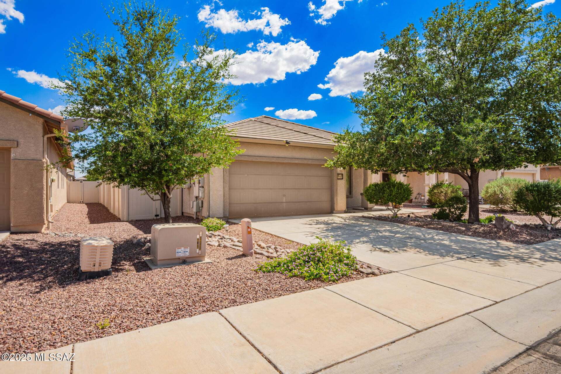 Move-In Ready + Paid-Off Solar!
Fall in love with this 4-bed, 2-bath Red Rock gem in a fun, family-friendly community! Enjoy paid-off solar that is covered under warranty, a newer HVAC, and a brand-new large-capacity water heater-so you can move right in and start saving.
Relax in your private extended side yard, perfect for play or peaceful evenings. The community has it all - two pools with slides, parks, basketball courts, and holiday events that make it feel like home year-round. Perfect community for a growing family as Marana grows!