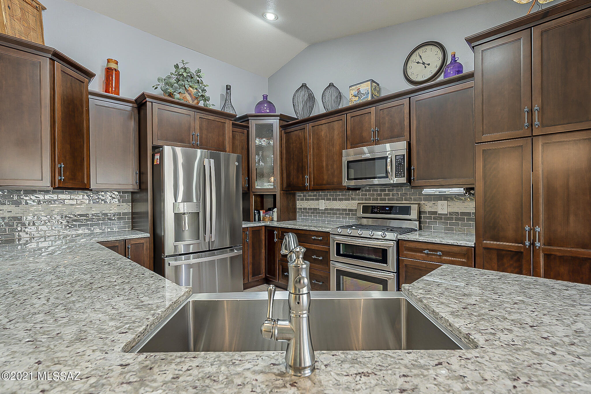 This Beautiful Diego with 2 beds/ Den plus hobby area in the laundry room is very well maintained. Fully upgraded kitchen with new cabinets, granite counters and new appliances. Remodeled masterbath and updated guest bath. New (2020) HVAC and WH, landscaping and irrigation. Backyard has screened in Arizona room, paver entertaining areas with peak of Mountain views. Front has courtyard and morning coffee area to meet neighbors. This home is in SaddleBrooke, a PREMIER active adult resort style community with amenities galore! You've found your new home!