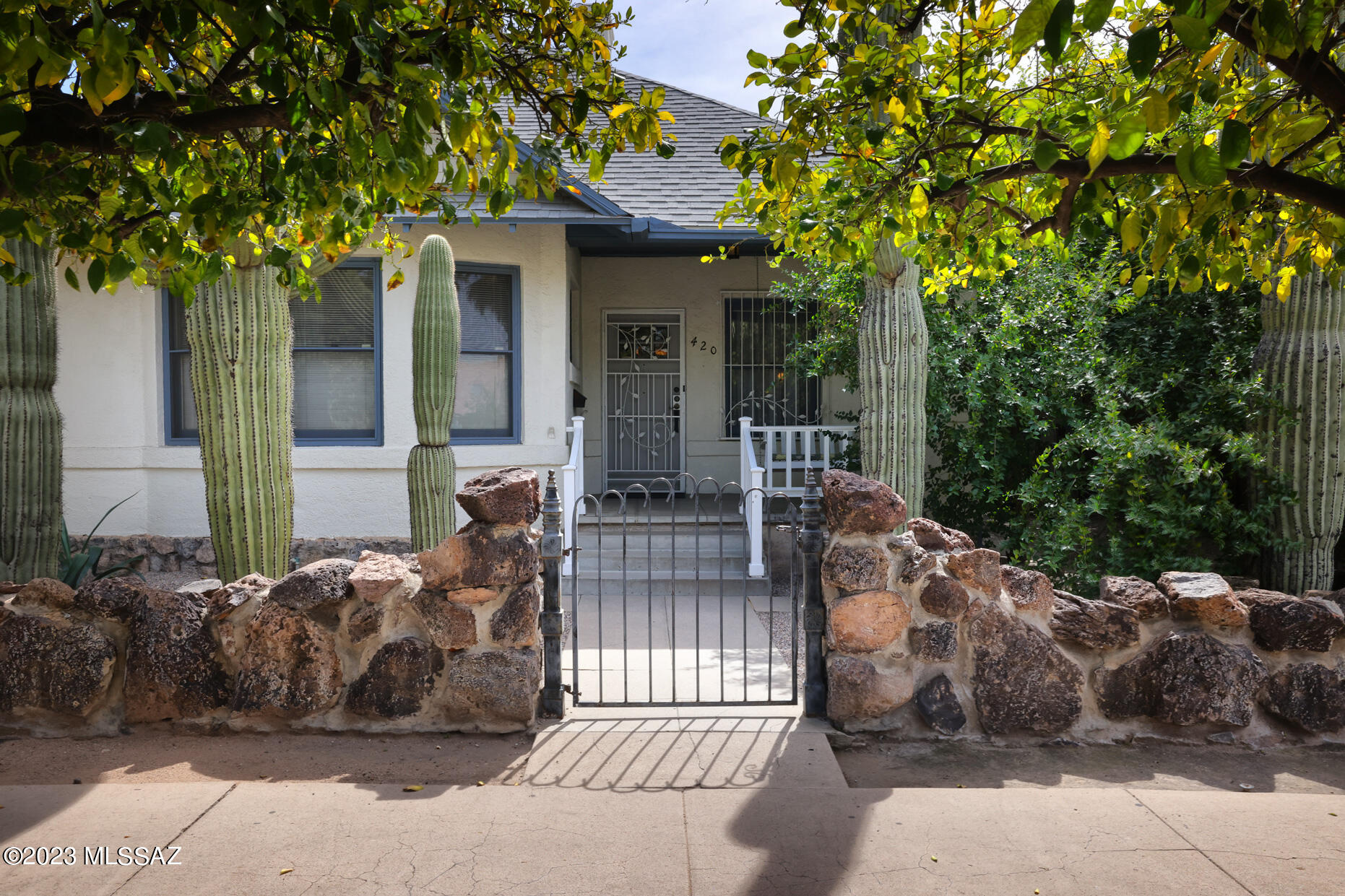 Impeccably and respectfully updated historic bungalow home in the heart of West University. Original wood floors, moldings, windows, built-ins, and architectural details, coupled with updated plumbing, electrical, HVAC, kitchen and bathrooms. Historic homes often lack storage, but this home has 7 closets, a pantry, a basement, a 2-car garage and nearly 1,000sqft of EASY-ACCESS attic space! Enjoy the secluded and shady walled back yard, or the front porch complete with swing. Pop over to any of several nearby cafes for coffee in the morning, dinner at night, or take 50 steps to the nearby streetcar stop to explore the rest of Main Gate and downtown. Limited SPDS. Listing agent is part owner and has a financial interest in the property, and is licensed to sell Real Estate in Arizona
