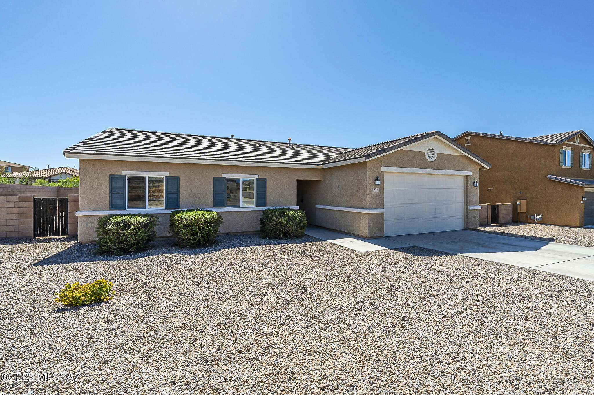 Move right into this 3 bedroom, 2 bath plus den, 1627 Sq Ft home. Bright and open floor plan with eat in kitchen, gorgeous cascading quartz island with seating, mocha cabinets, gas range, French sink and convenient pass-through laundry room. Relax in the master suite with ample walk in closet and dual vanities. Modern lighting, custom paint, beautiful tile and wood laminate floors throughout. Enjoy family bar B Qs in your low care backyard on the covered patio with fan, extended brick pavers, turf, built in planting beds and amazing mountain views! Located in The Award-Winning Vail School District.