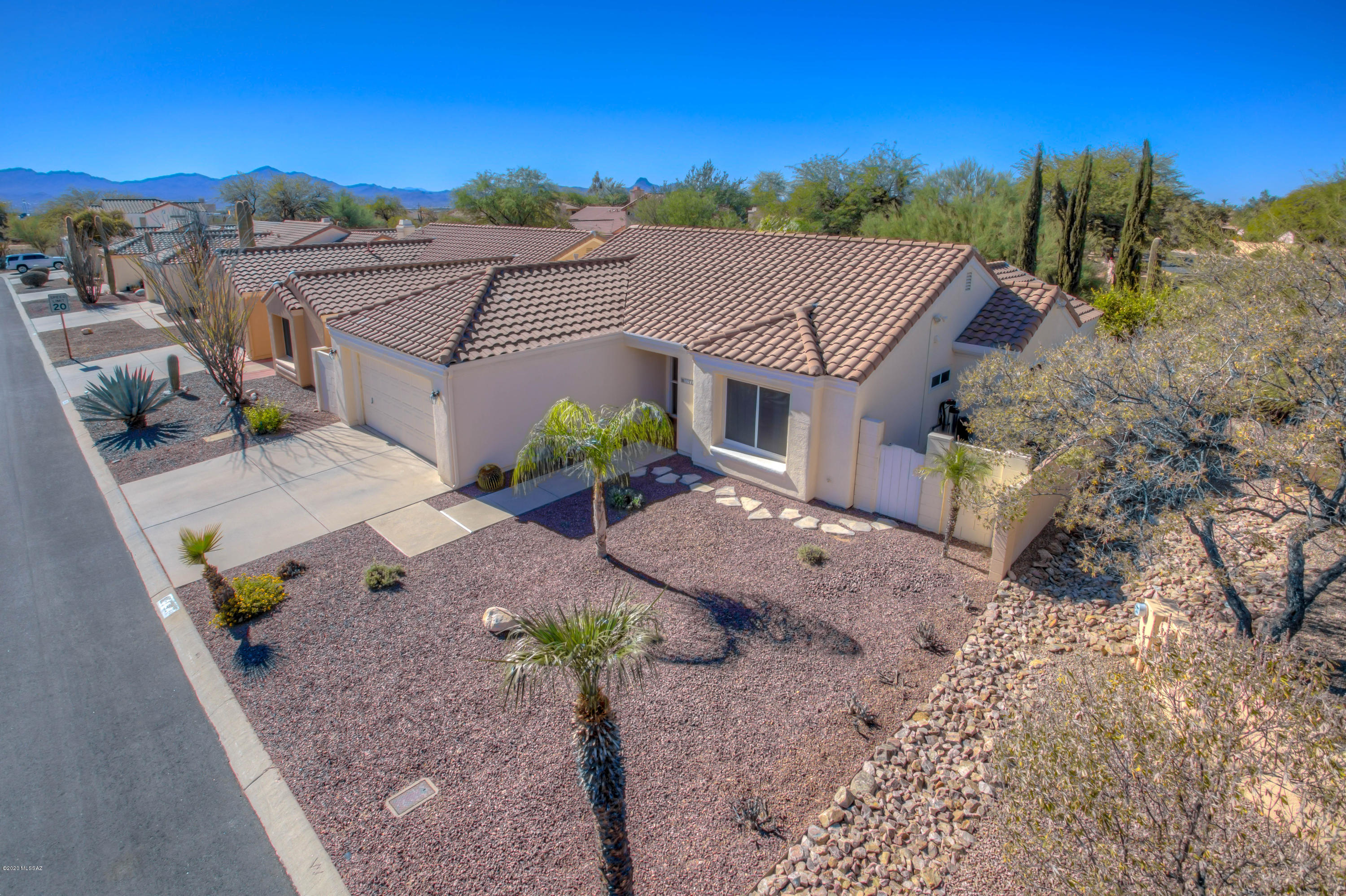 Immaculately maintained, upgraded home in North Ranch. Enjoy the privacy of a corner lot with a low maintenance paver backyard backing up to open space, complete with covered patio.  New energy-efficient dual pane windows, new HVAC, tile floors, and updated bathrooms. HUGE Community Pool, Spa, Parks, Ramada, and Tennis Courts. This home will not last; make your appointment to see today!