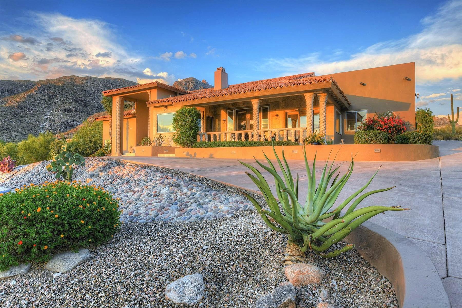 Elevated private estate in gated Sin Vacas awaits this Mediterranean Masterpiece surrounded by spectacular Catalina Mtn views & sparkling city lights. Architecturally discerning & exquisitely executed with almost 3800 sf of the high quality upgrades blend together into this ultimate of luxury living. Grand entrance has Cantera columns & exquisite foyer w/tiled archway. Gourmet Kitchen is fully equipped w/generous island, Electrolux appliances including 6-burner range, pot filler faucet, two way FP & sweeping views of valley lights. Split bedroom plan offers guest quarters w/sitting area & private covered patio. Luxurious master suite has bonus office space plus garden tub to enjoy fantastic views of the lush desert. Entertain guests in the secluded backyard or by the refreshing pool & spa! Check out the 3D Showcase under Virtual Tour!