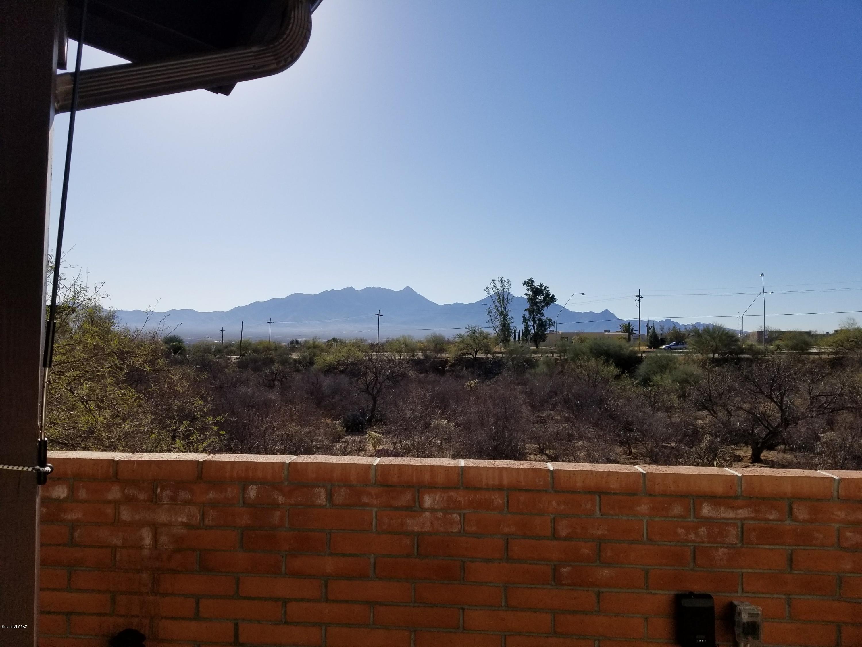 If You are looking for a View here it is.
You also get a SFhome in Continental Vistas, 3 bdrms, or 2 bdrm and den, a bonus room with new wall htr/a/c. a pre inspected home with repairs almost completed, 3 patios, which enable you to be in the sun  or shade, electric rolling shades on South side of house