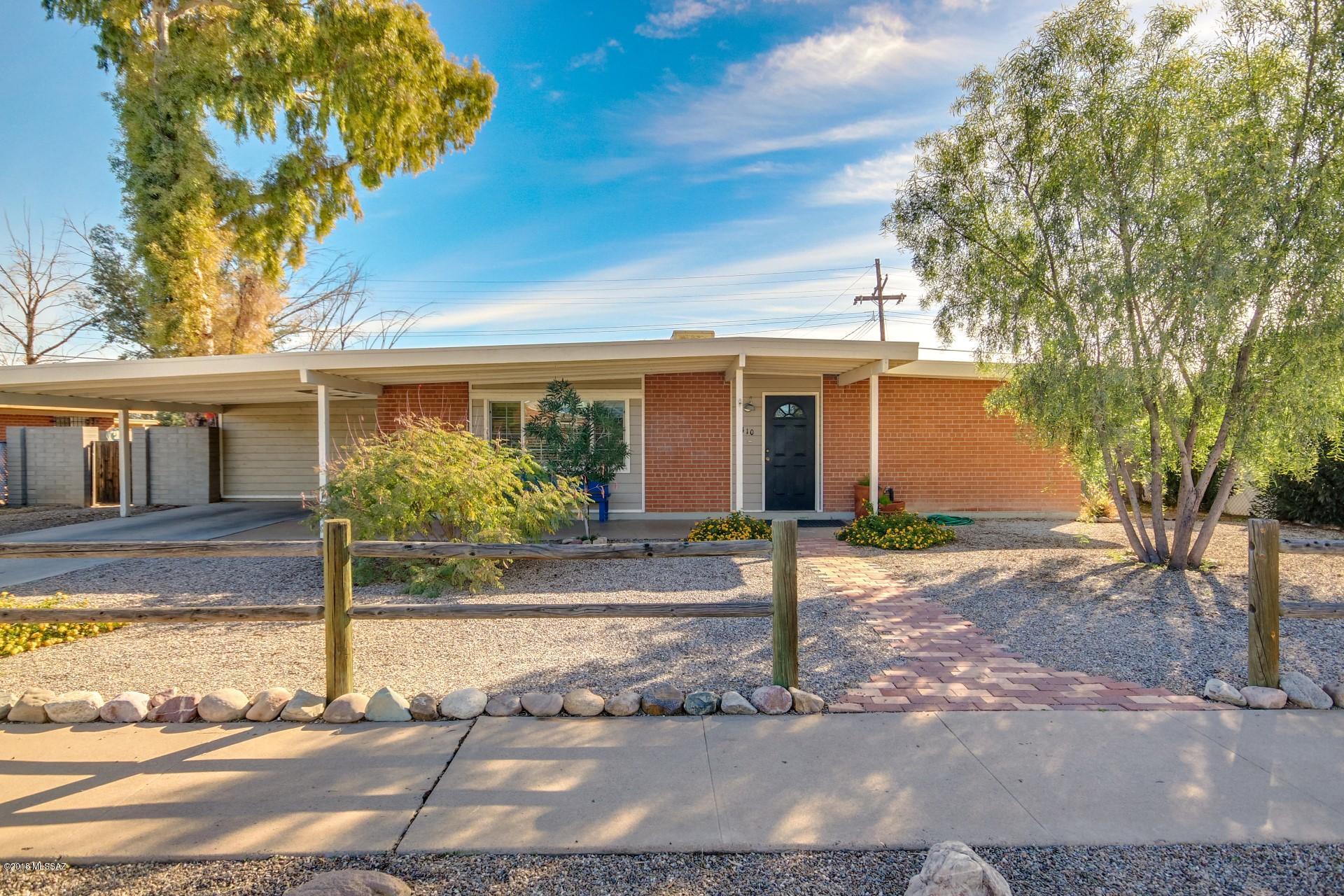 Outstanding Mid-Century Modern Ranch Style Home. Meticulous Home inside and out. Soothing palette, beautiful wood plank tile floors, plantation shutters, upgraded lighting, and formal dining area. Charm & Character abound! French doors to patio from eat-in kitchen. Stylish kitchen counters, breakfast bar, neutral tile floor, and plethora of white wood cabinetry. Perfect Home for entertaining. Master retreat boasts updated en suite. Extra Bonus Room that can be used as a forth bedroom, or office. Generous size bedrooms, ample closets, and 2 baths. Enjoy the spacious backyard with covered patio, hot tub, patio for BBQing, and workshop. Will not last!!